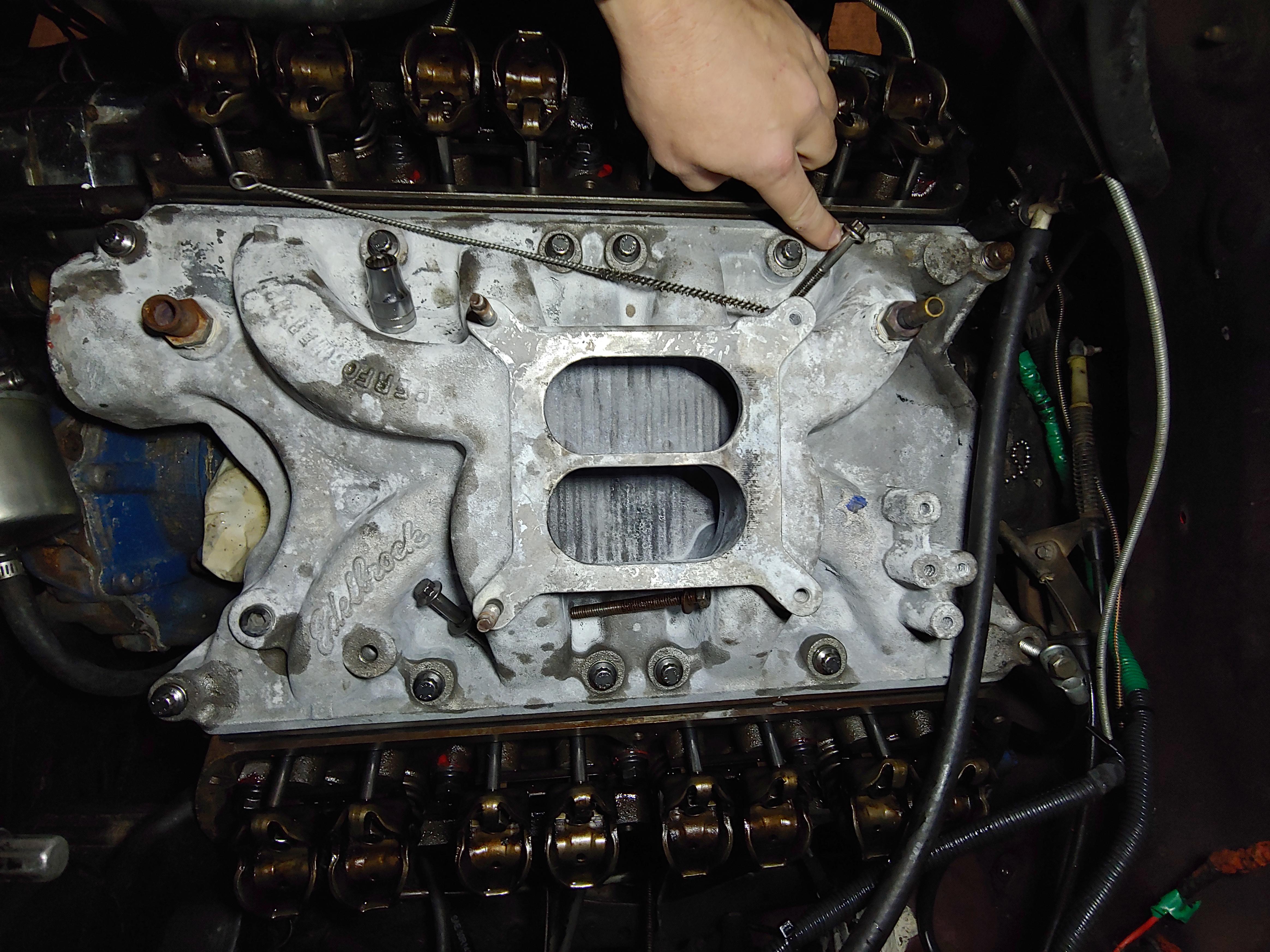 351 Windsor intake manifold. All new bolts thread except for the two