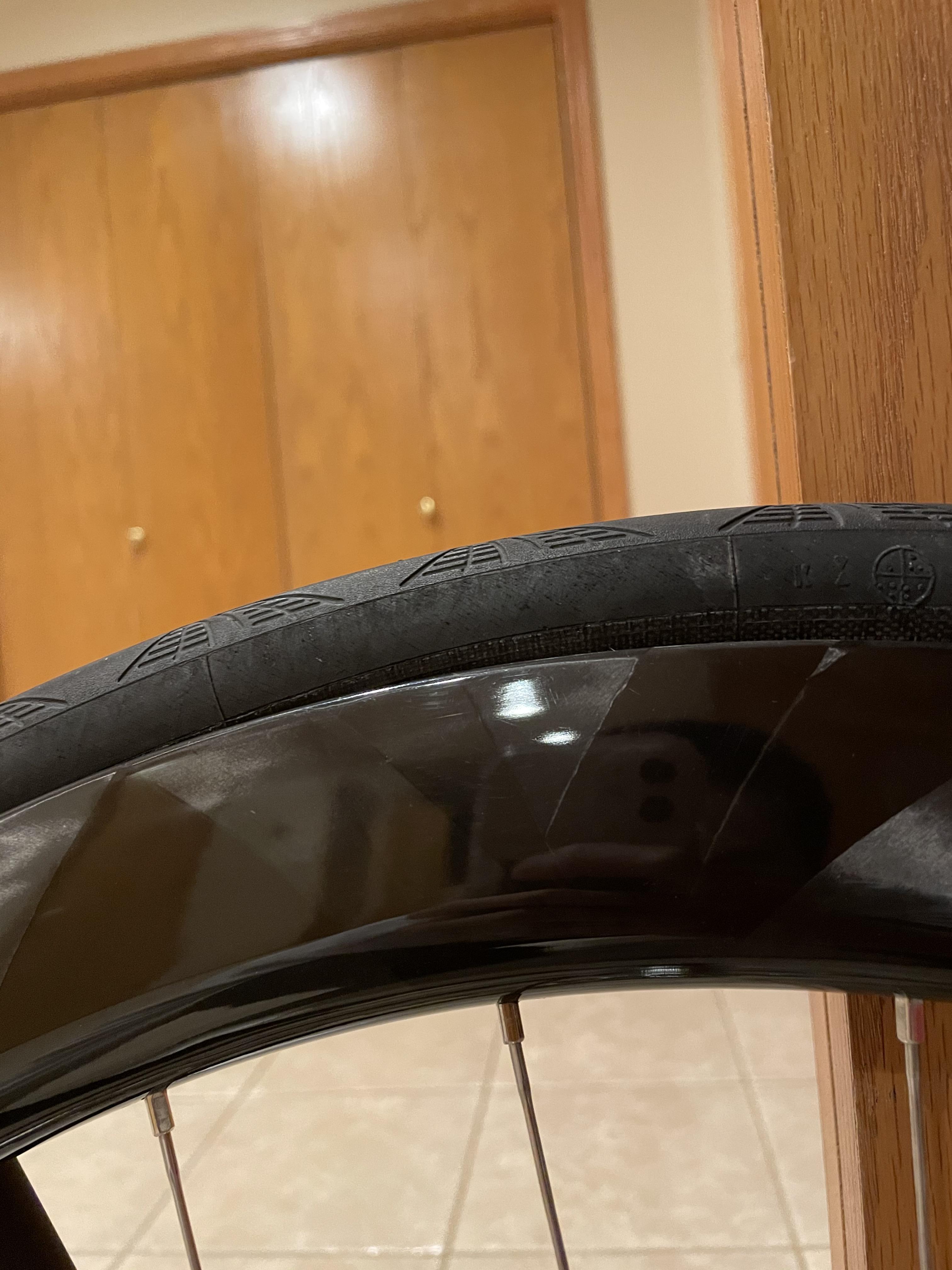 standard tube and tire on tubeless rim. there are bulges where the tire