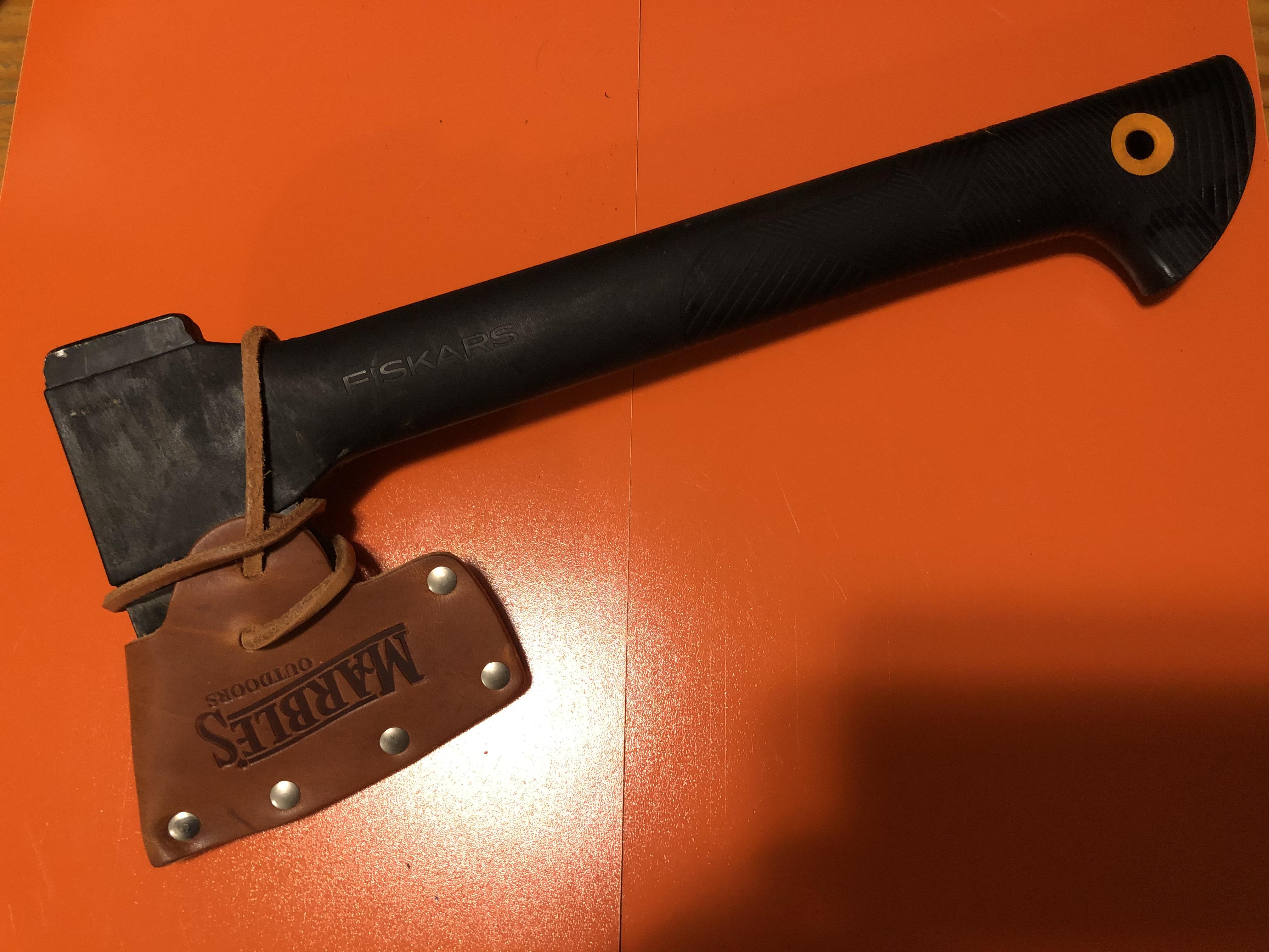 Just picked up a Marble No. 10 axe sheath and it fits the Fiskars 14