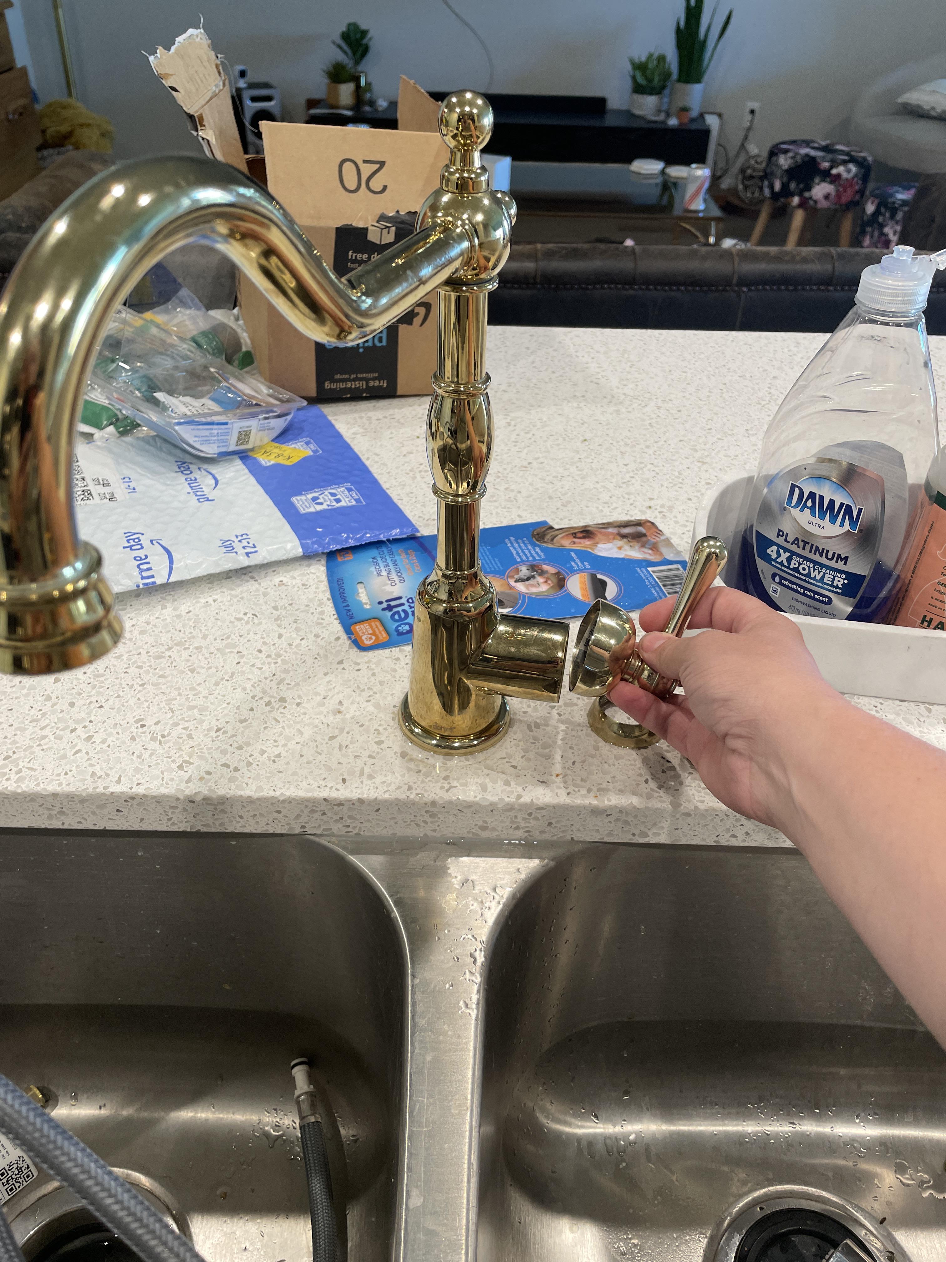 Installed faucet, turned water on and water immediately sprayed out