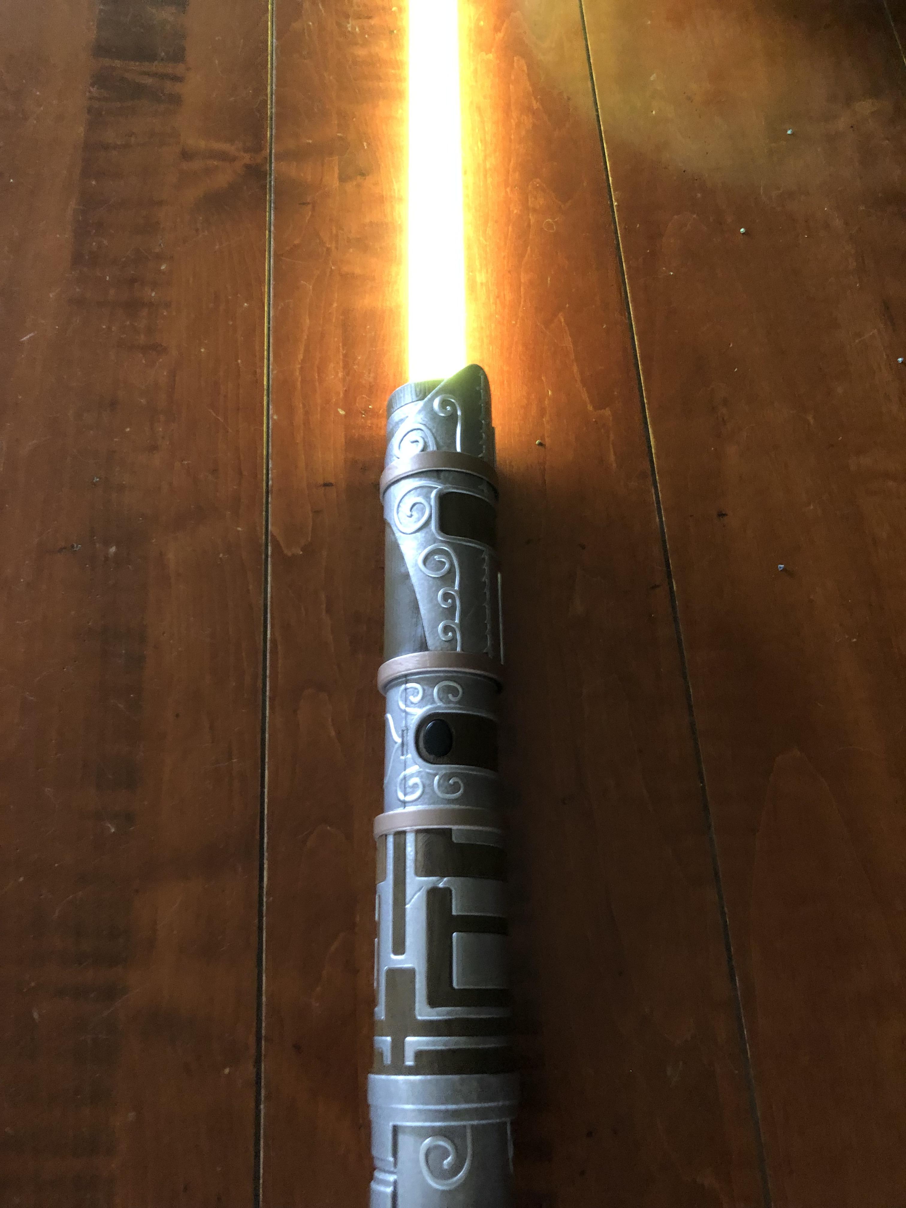 My elemental saber with the yellow kyber crystal I bought from DokOndar’s yesterday! r