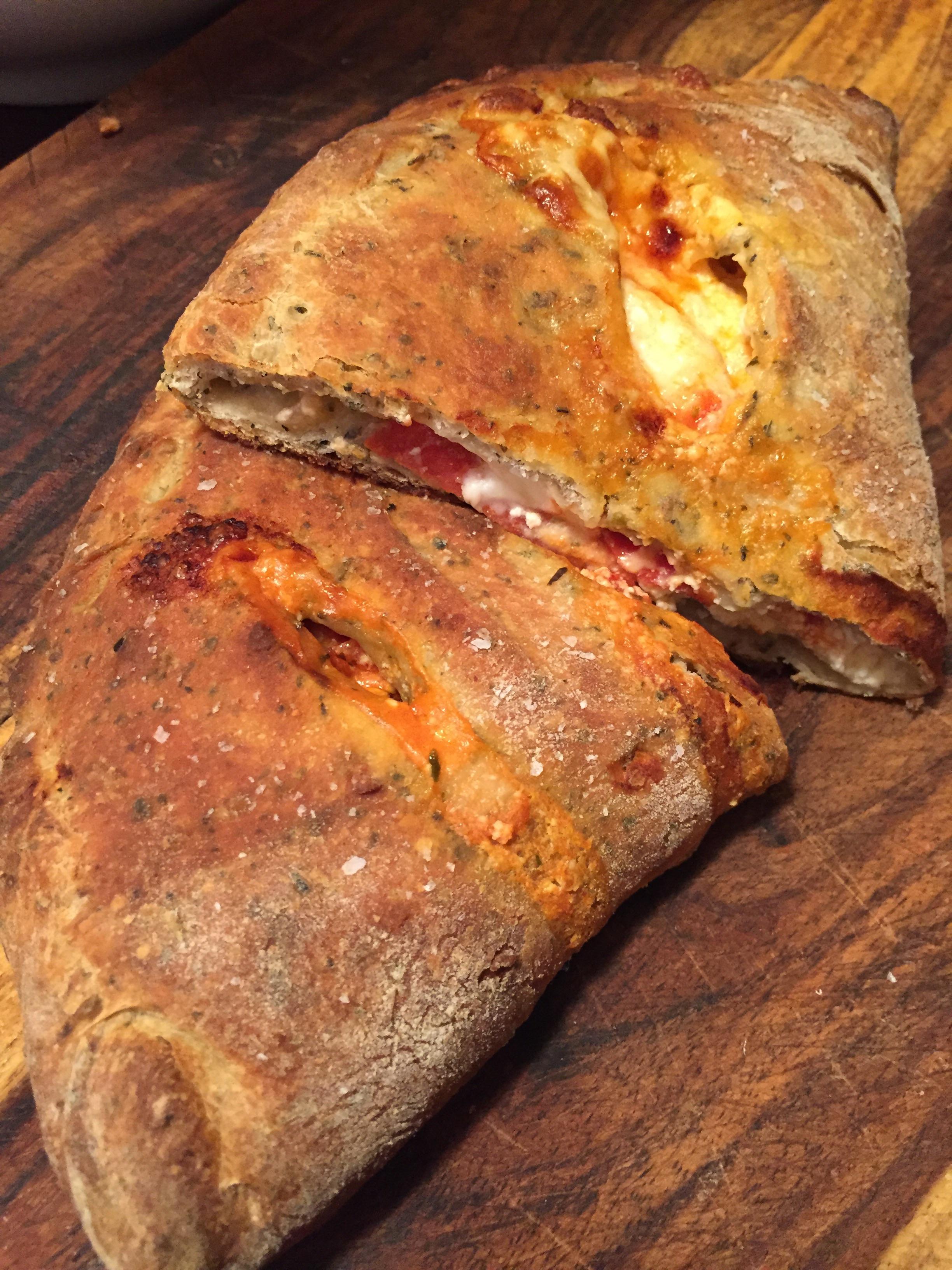Homemade pepperoni and ricotta calzone. (It has sauce inside. I still