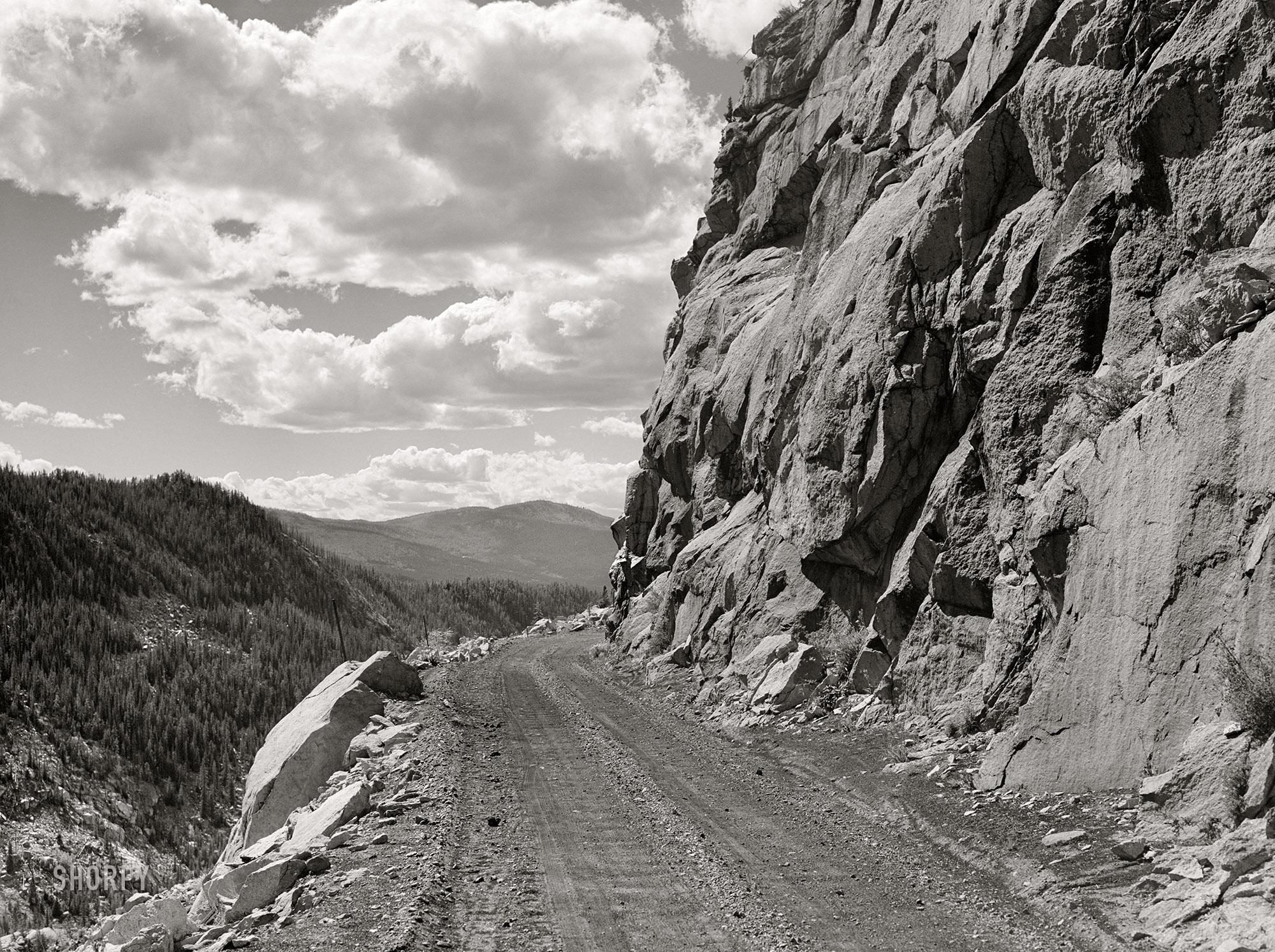 Road leading out of Carlton Tunnel along bed of old narrow gauge