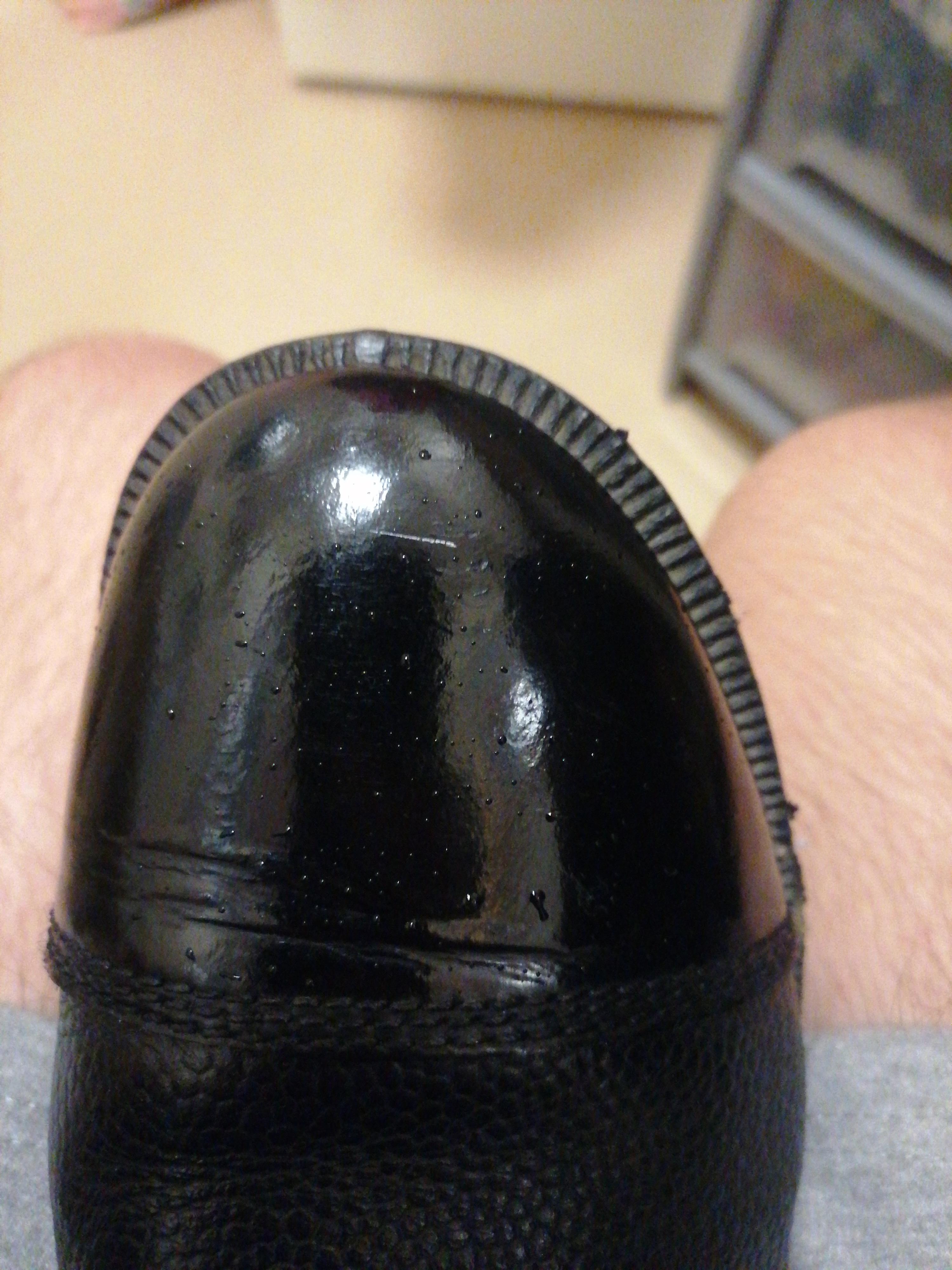 Polishing boots, halfway to mirror shine r/PolishingPorn