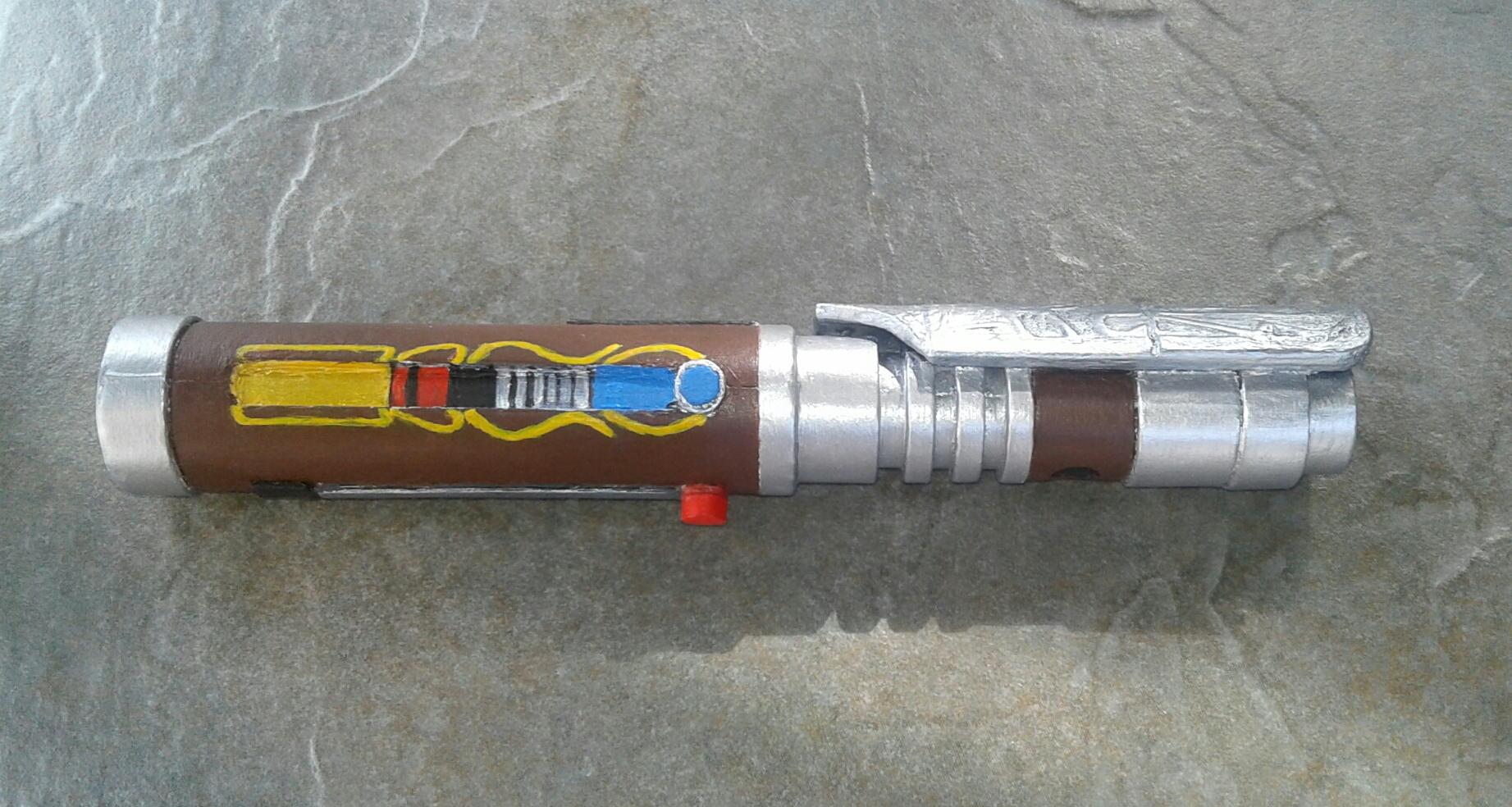 Orgus Din's lightsaber made out of paper r/swtor