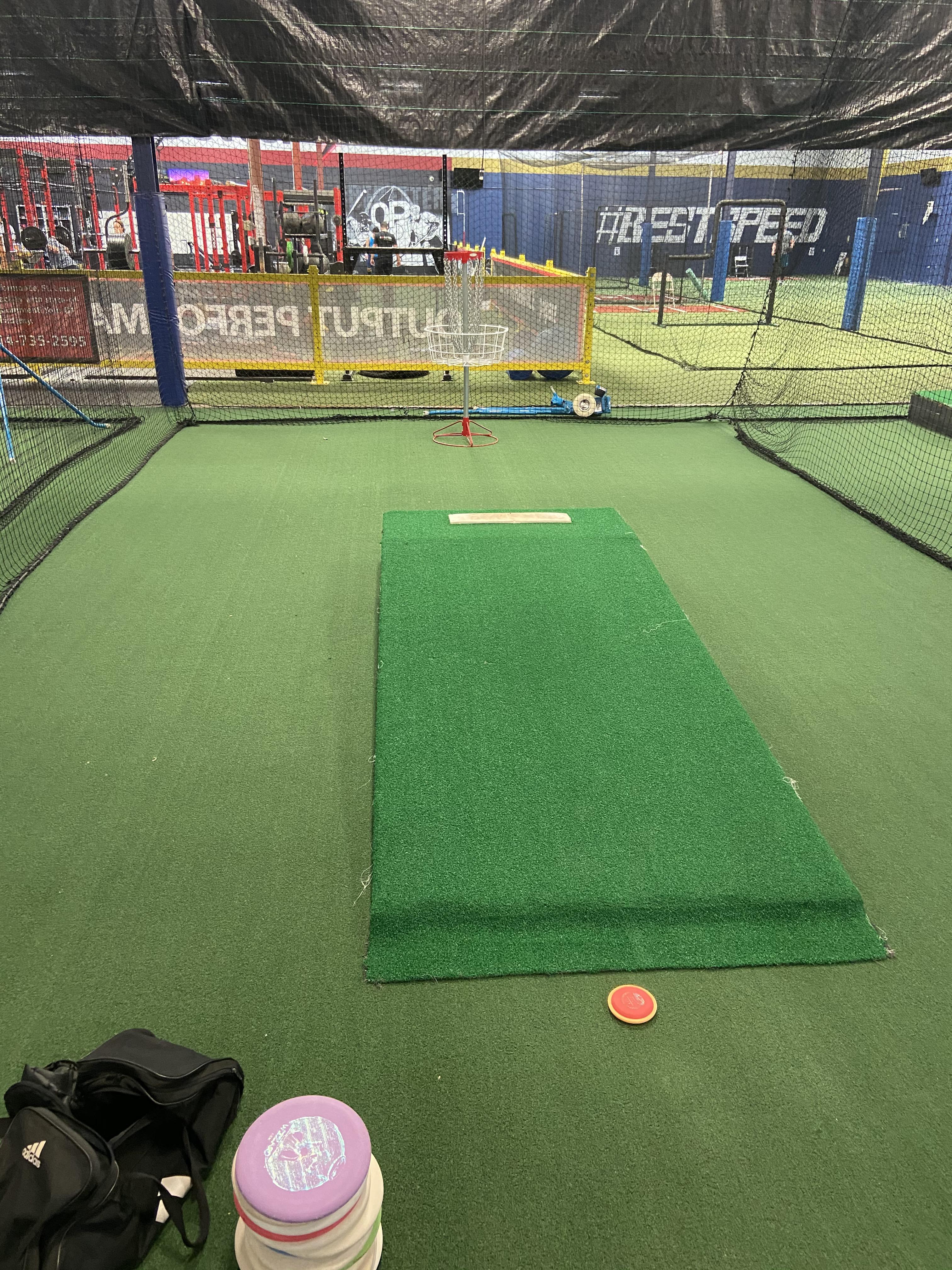 Indoor putting and throwing practice at 314 Training Academy in St