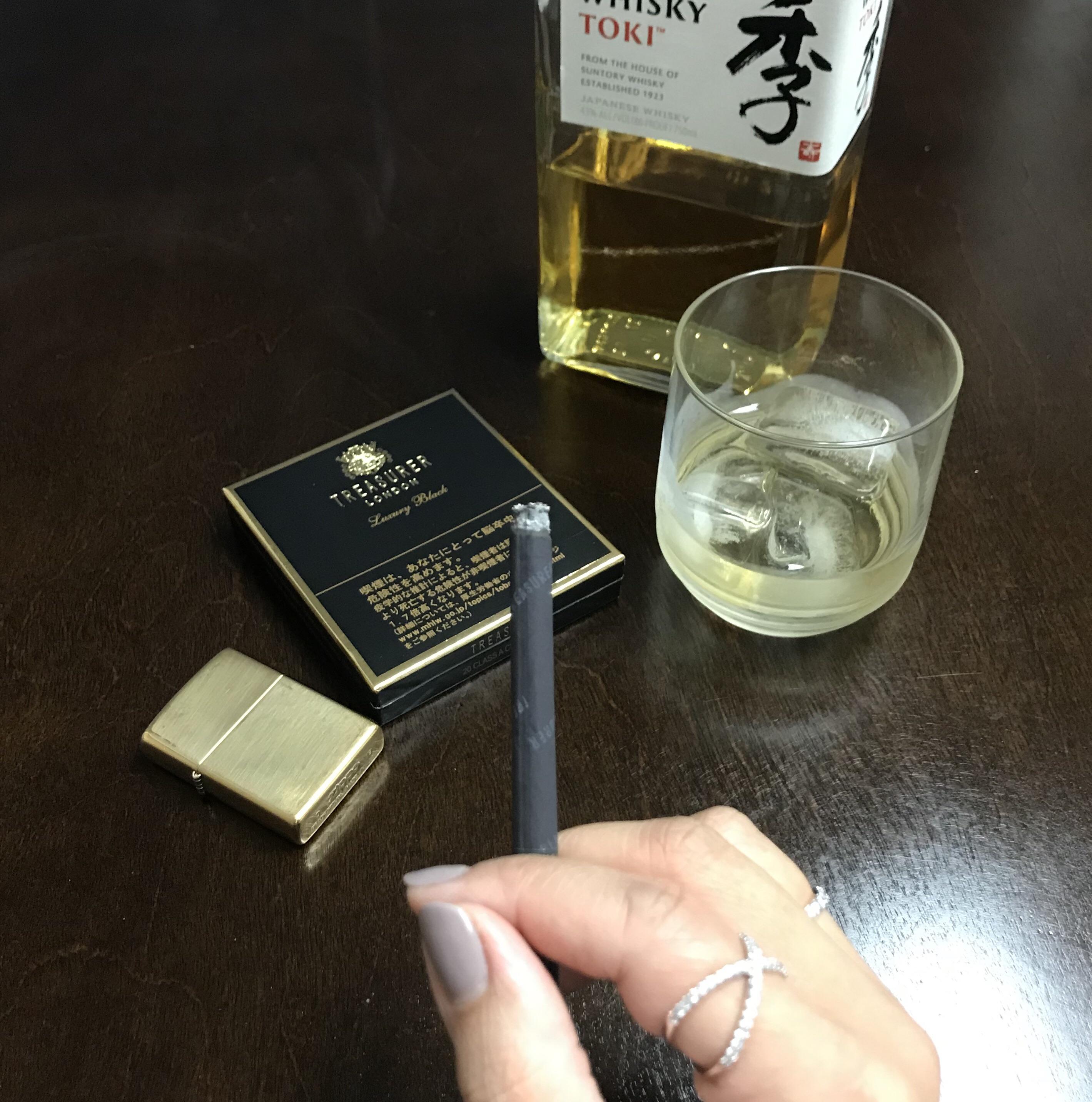 Suntory whiskey and Treasurer Luxury Black for tonight r/Cigarettes