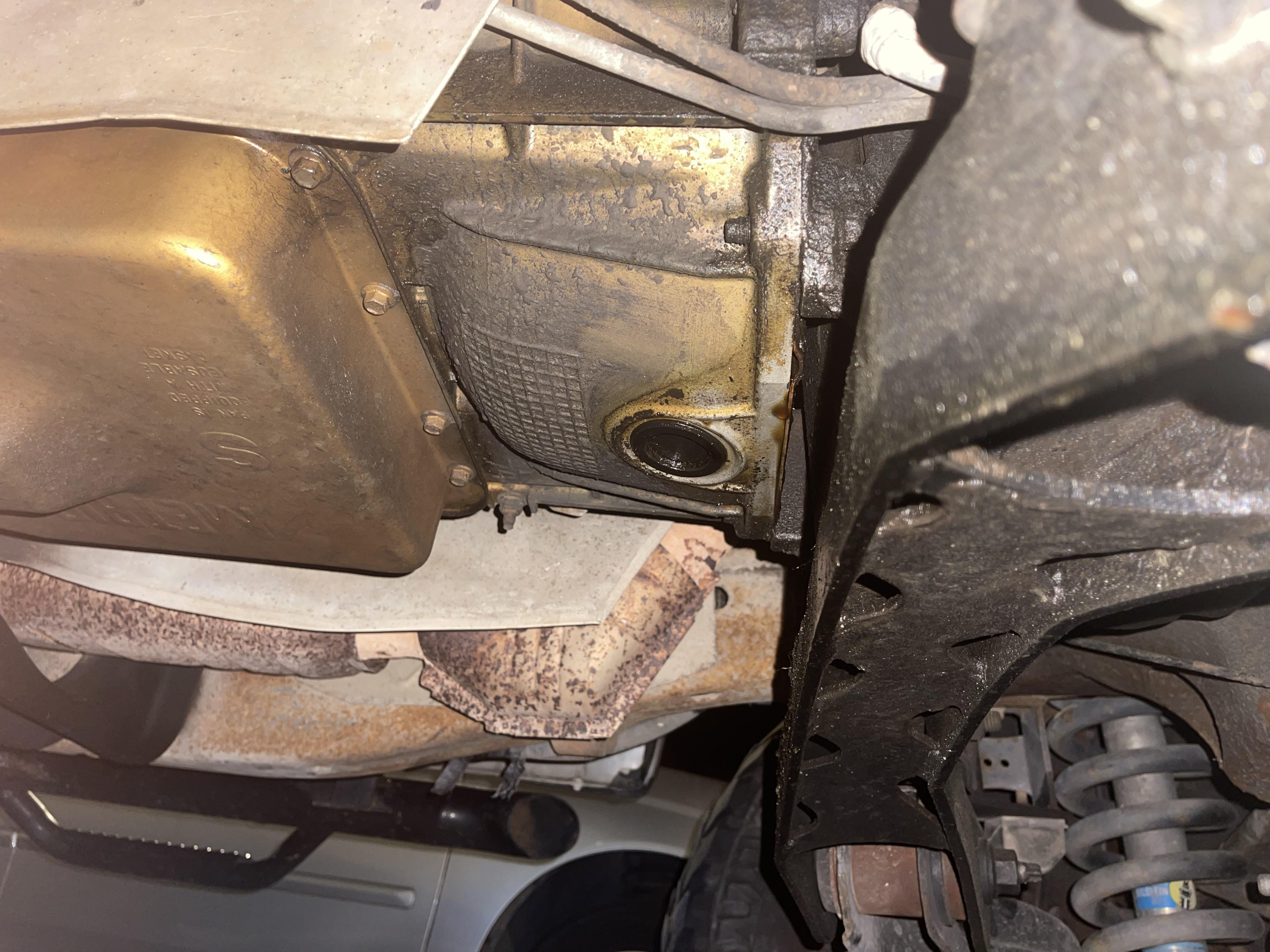 dripping oil leak from bottom of my 2003 Ford F150. its near the oil