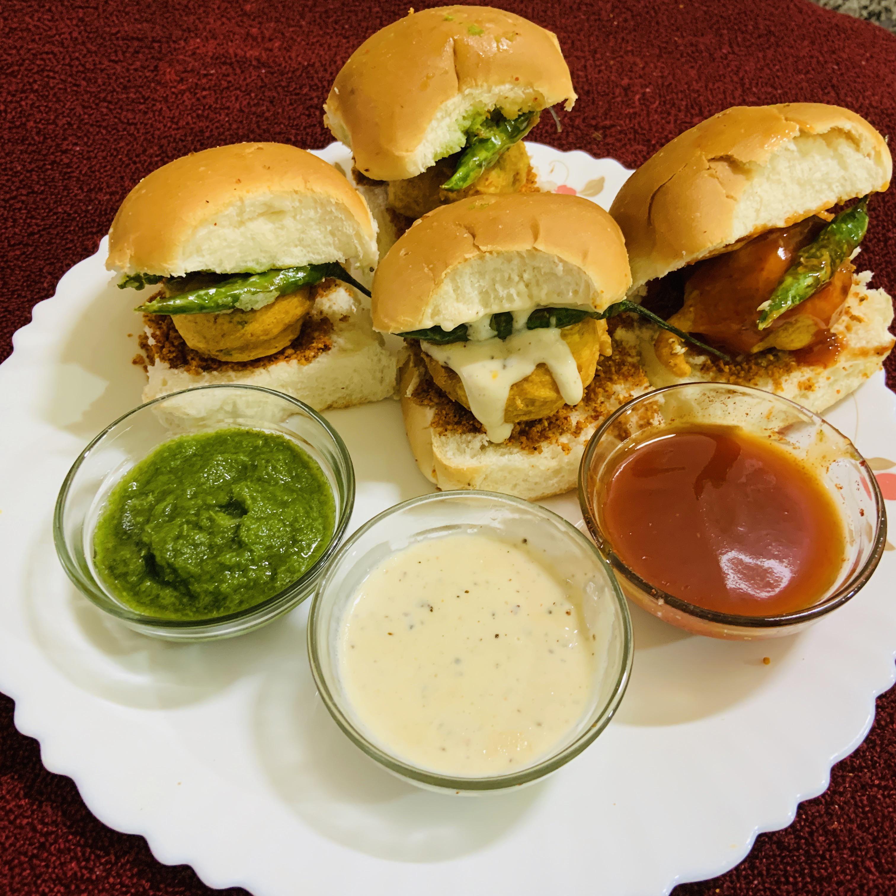 [Homemade] Mouthwatering Vada Pav with green chutney , tomato sauce and