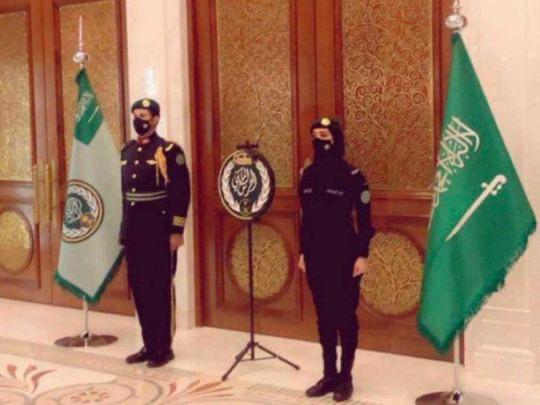 Newly enlisted female SRG (Saudi Royal Guard) stands guard by the gates
