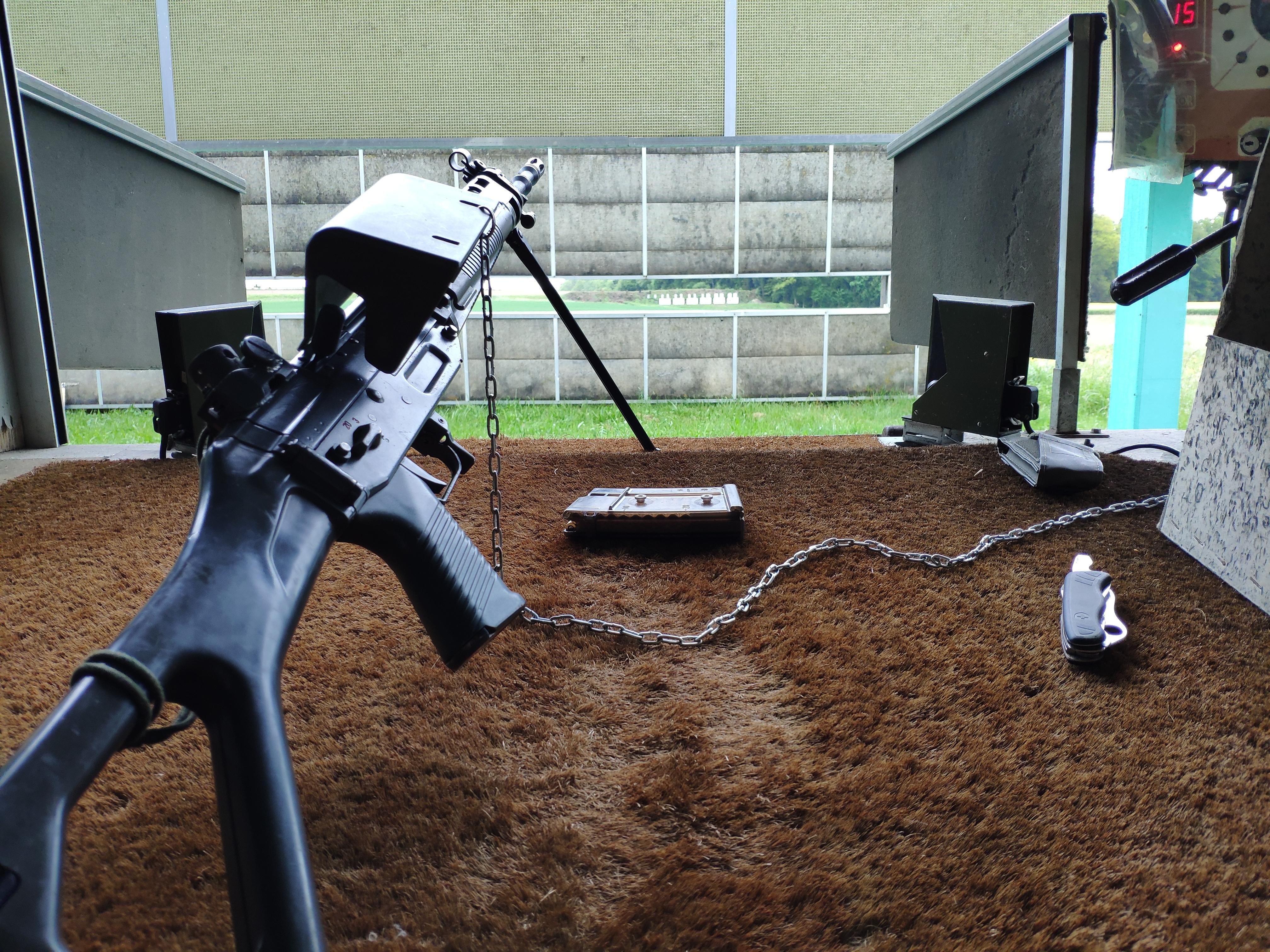 300meters (328yards) with iron sights is what we shoot in Switzerland