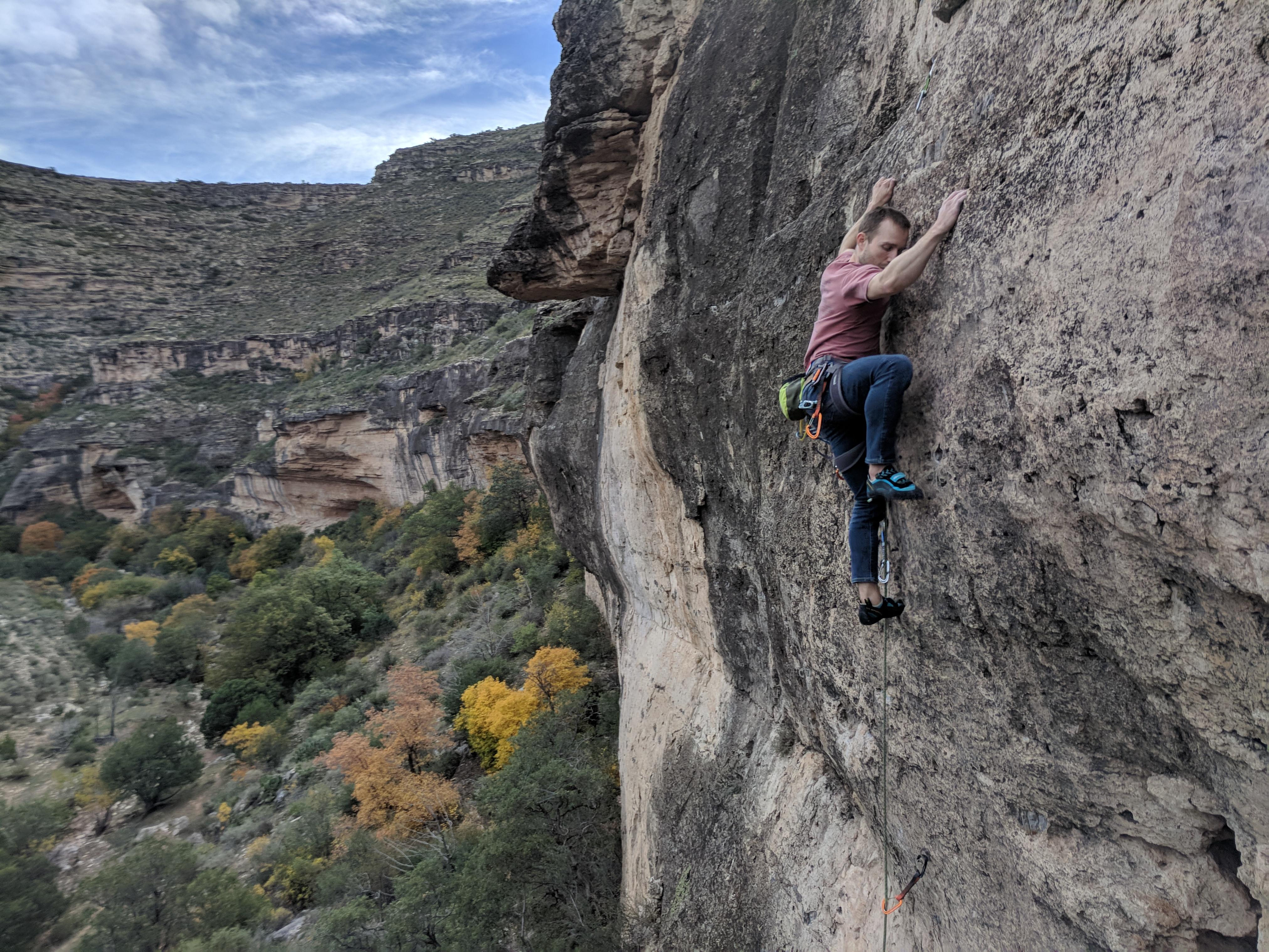 Climbing a slabby 5.11 in Last Chance Canyon, New Mexico. Thrilled to