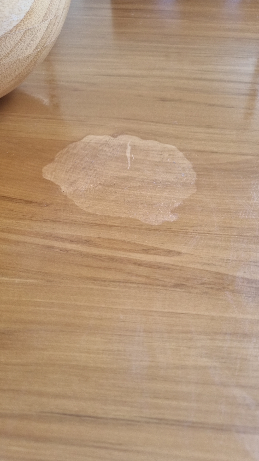 I accidently spilt acetone on my parents wooden table and i think it