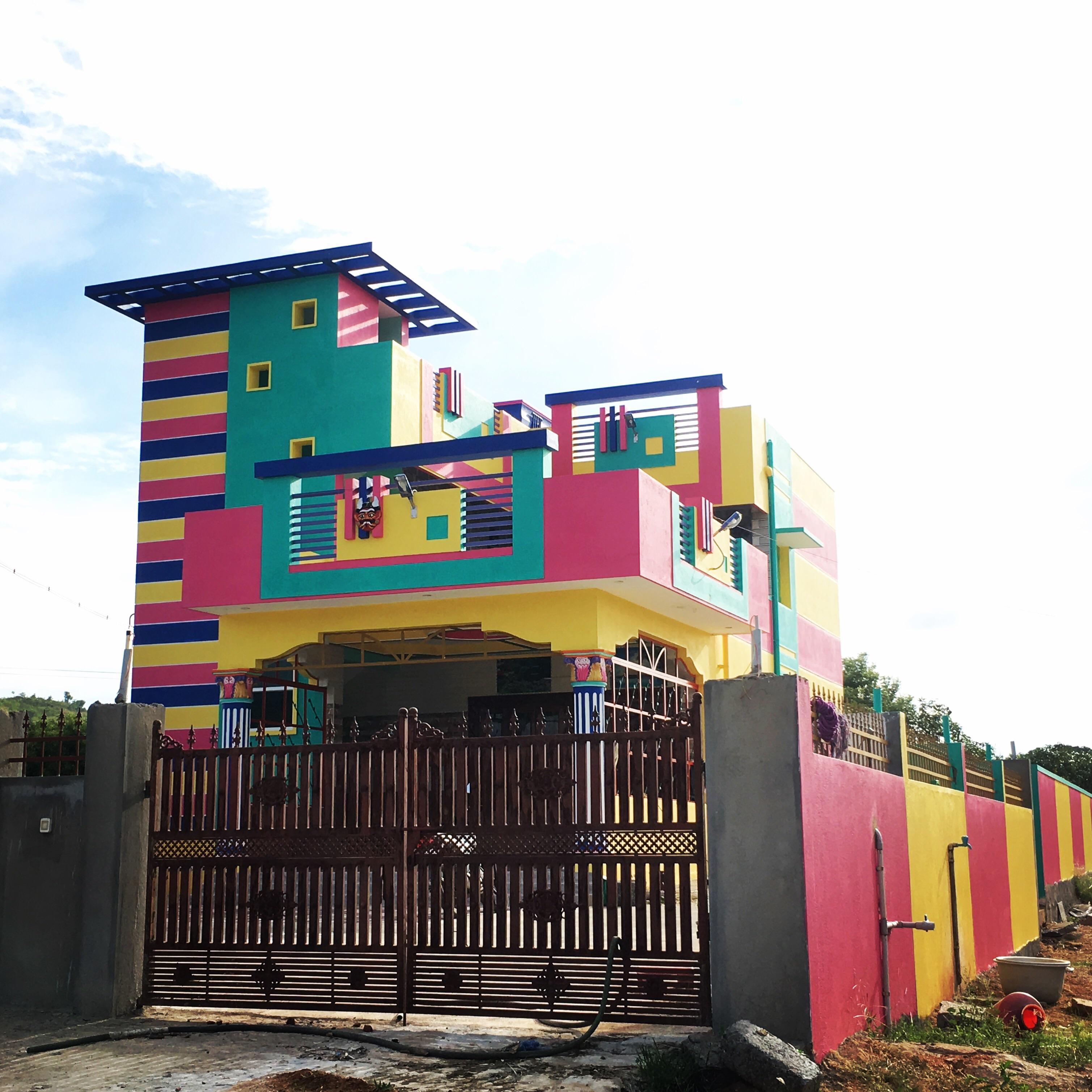 This rainbow house a redditor came across r/90sdesign