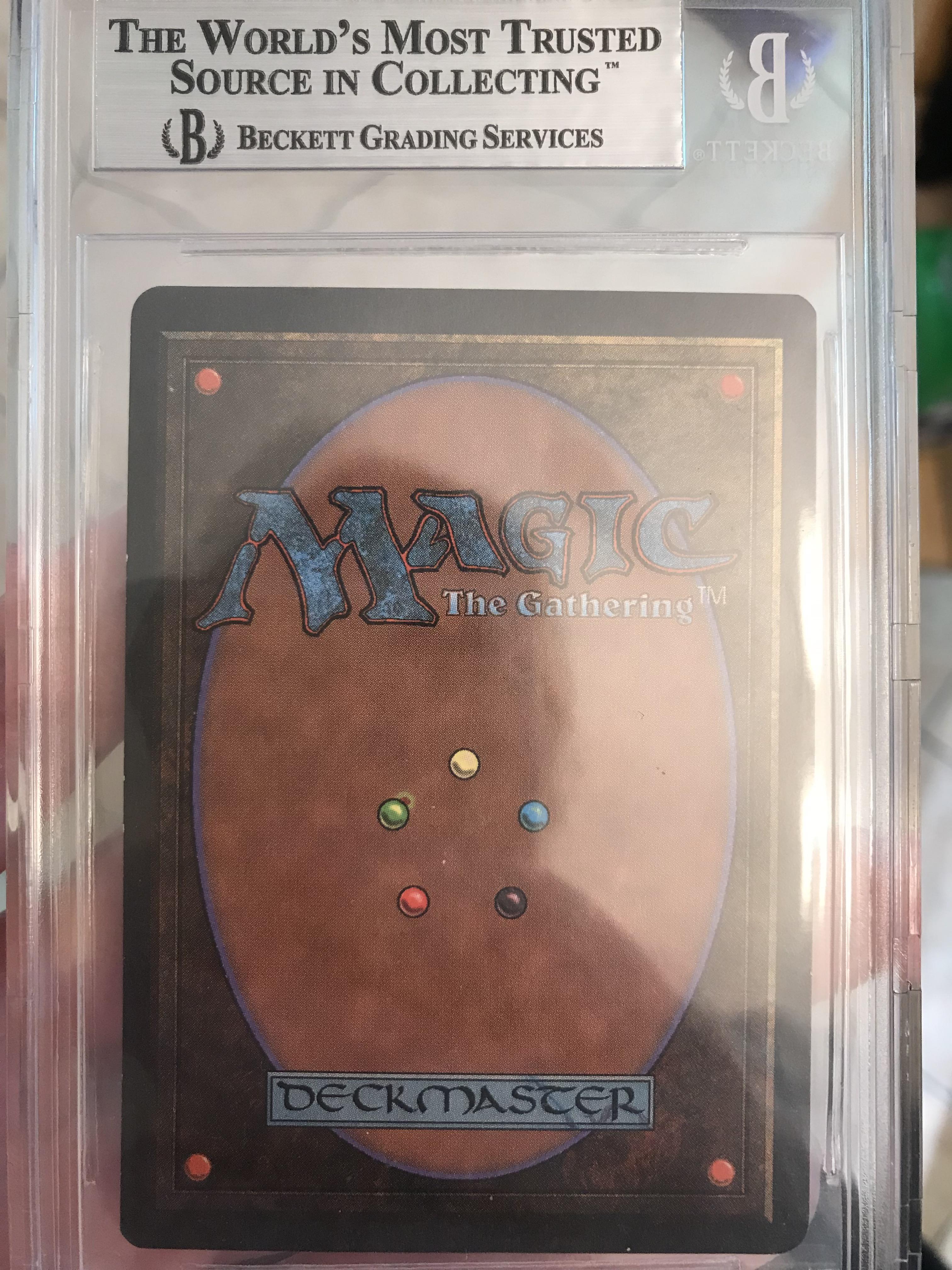 I have a unlimited card in a Beckett case that’s marked 8.5, if you look at the green dot there