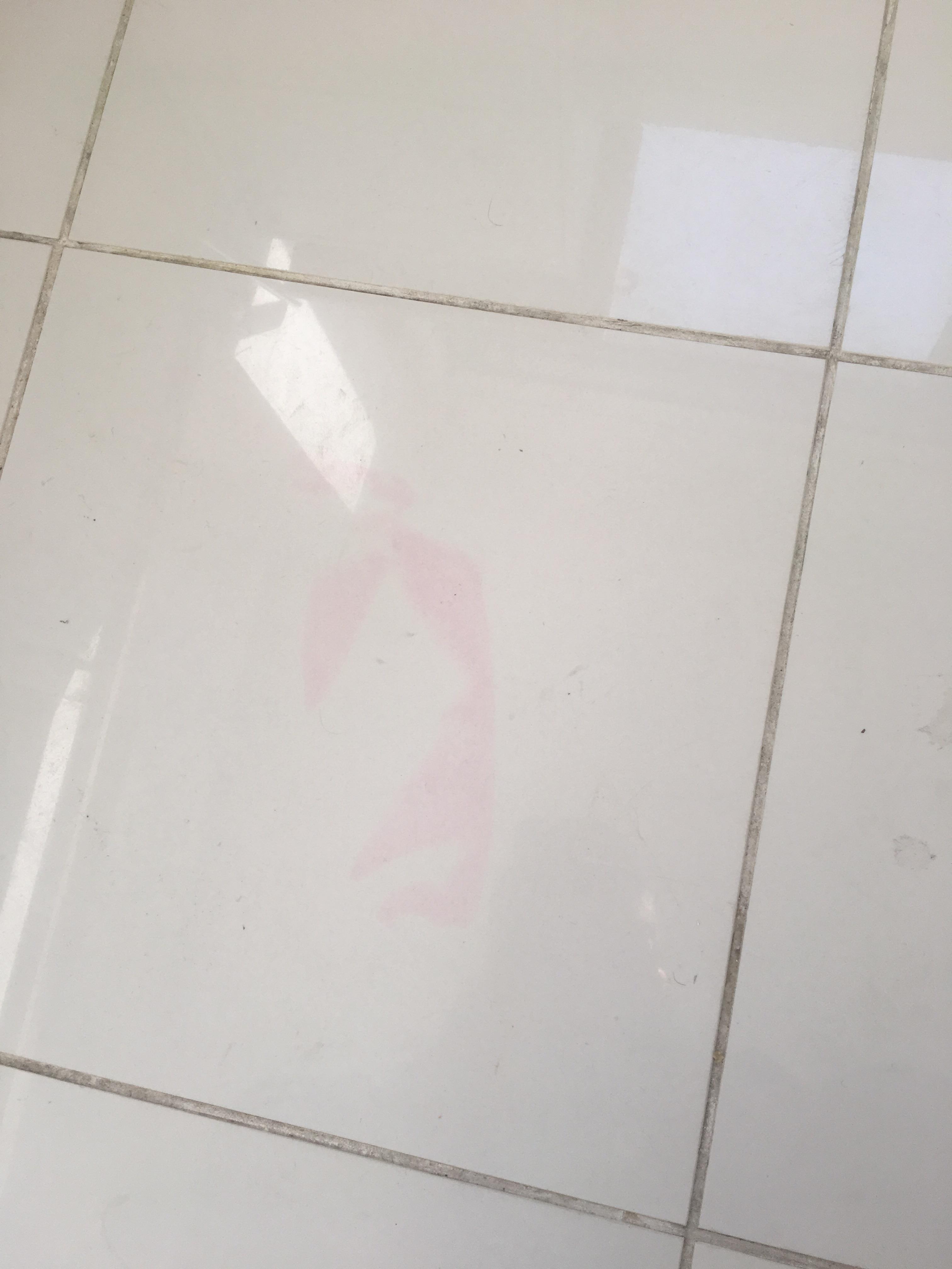 Just curious if anyone knows how to get this pink stain out of a tile