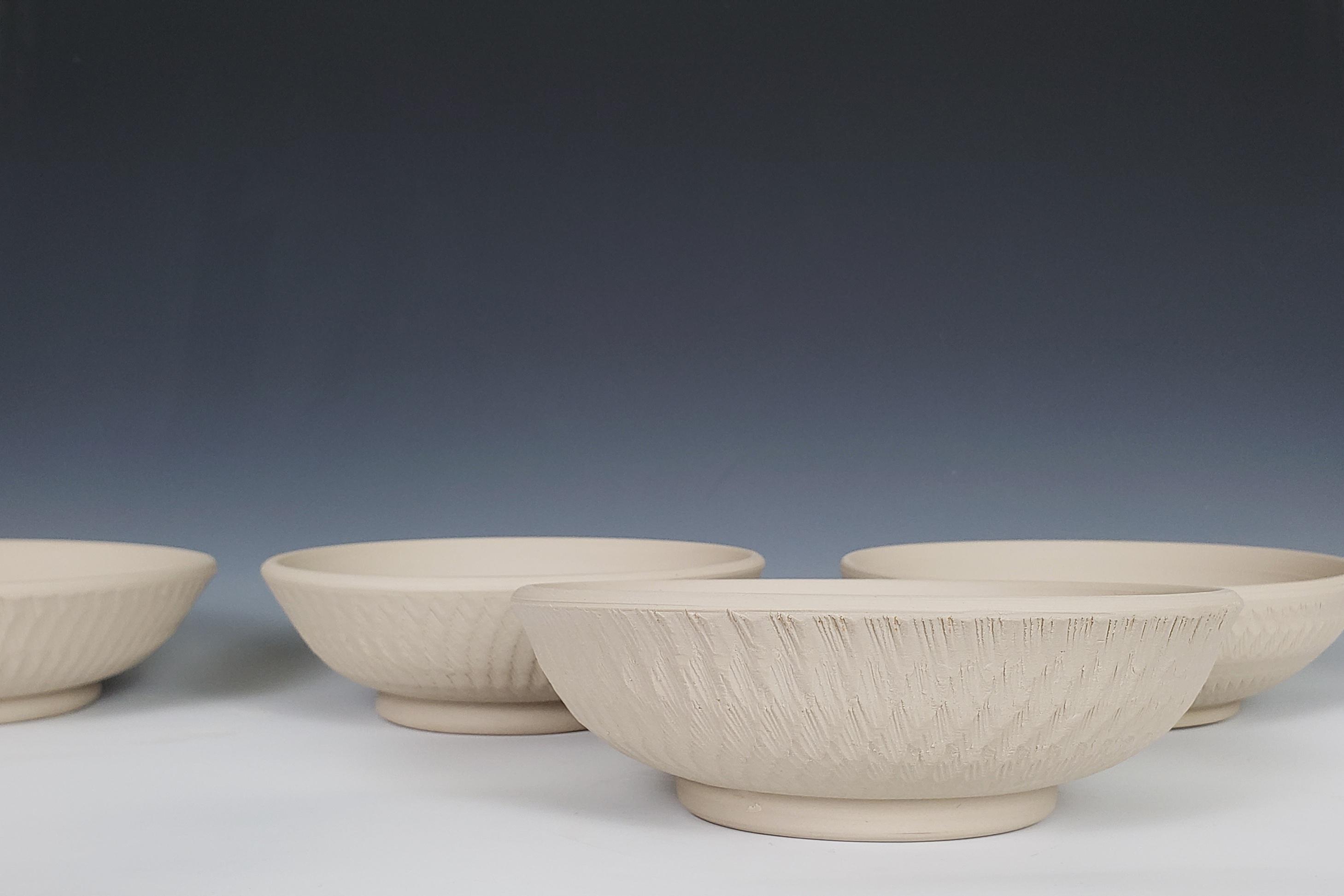 I almost don't want to fire these. They look so pretty as green ware