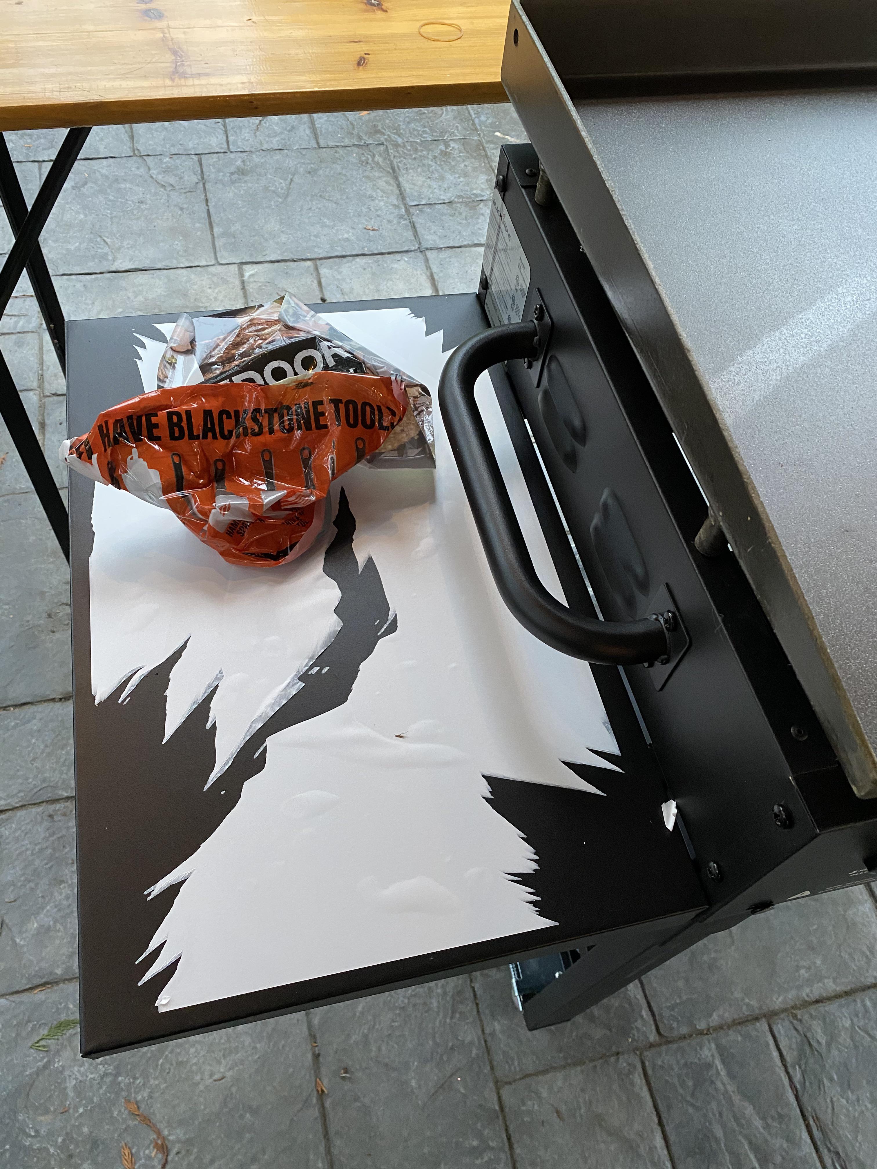 Grill assembly includes peeling off hundreds of tiny shreds of a 12in