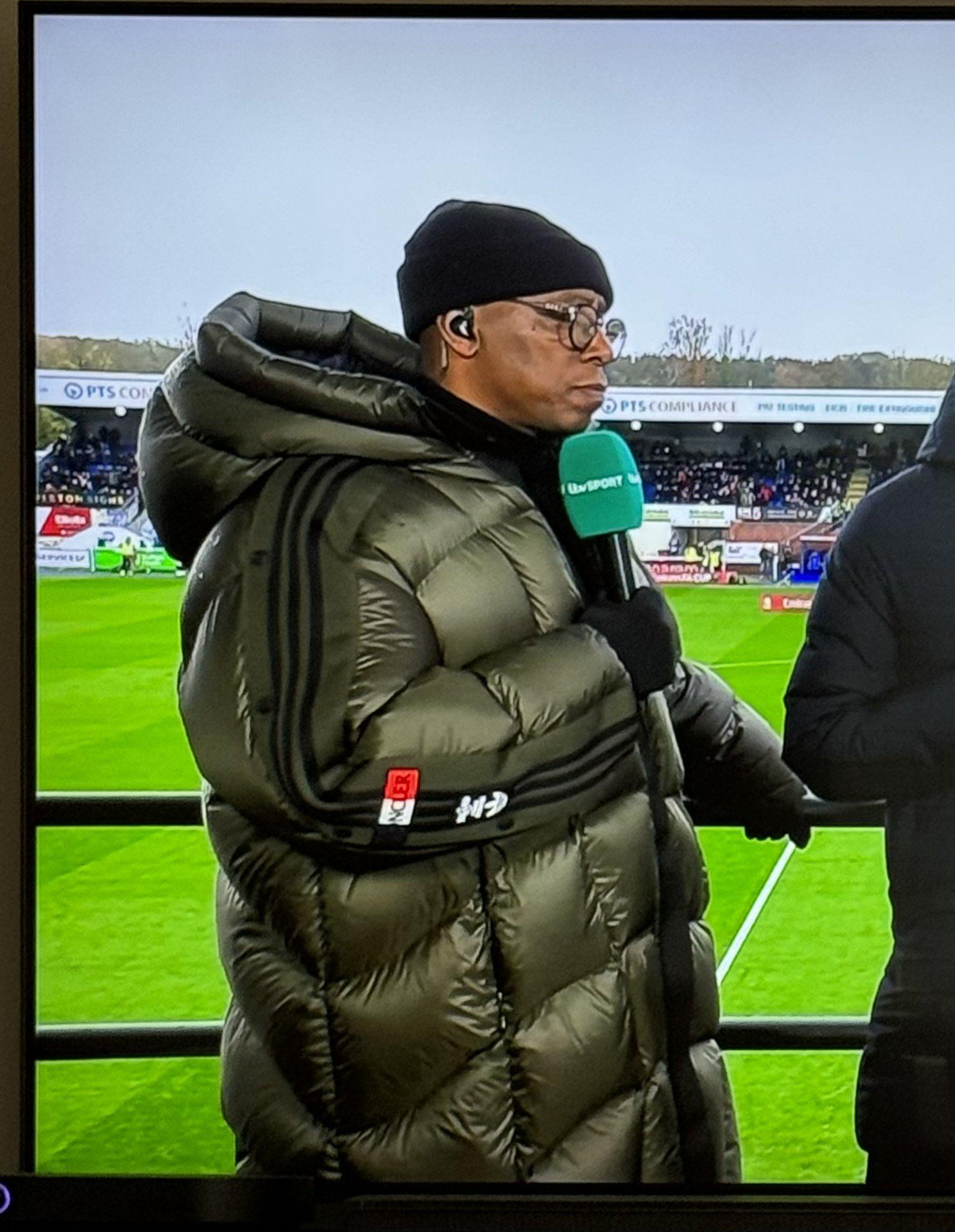 Ian Wright wearing an absolute unit of a Coat r/Gunners