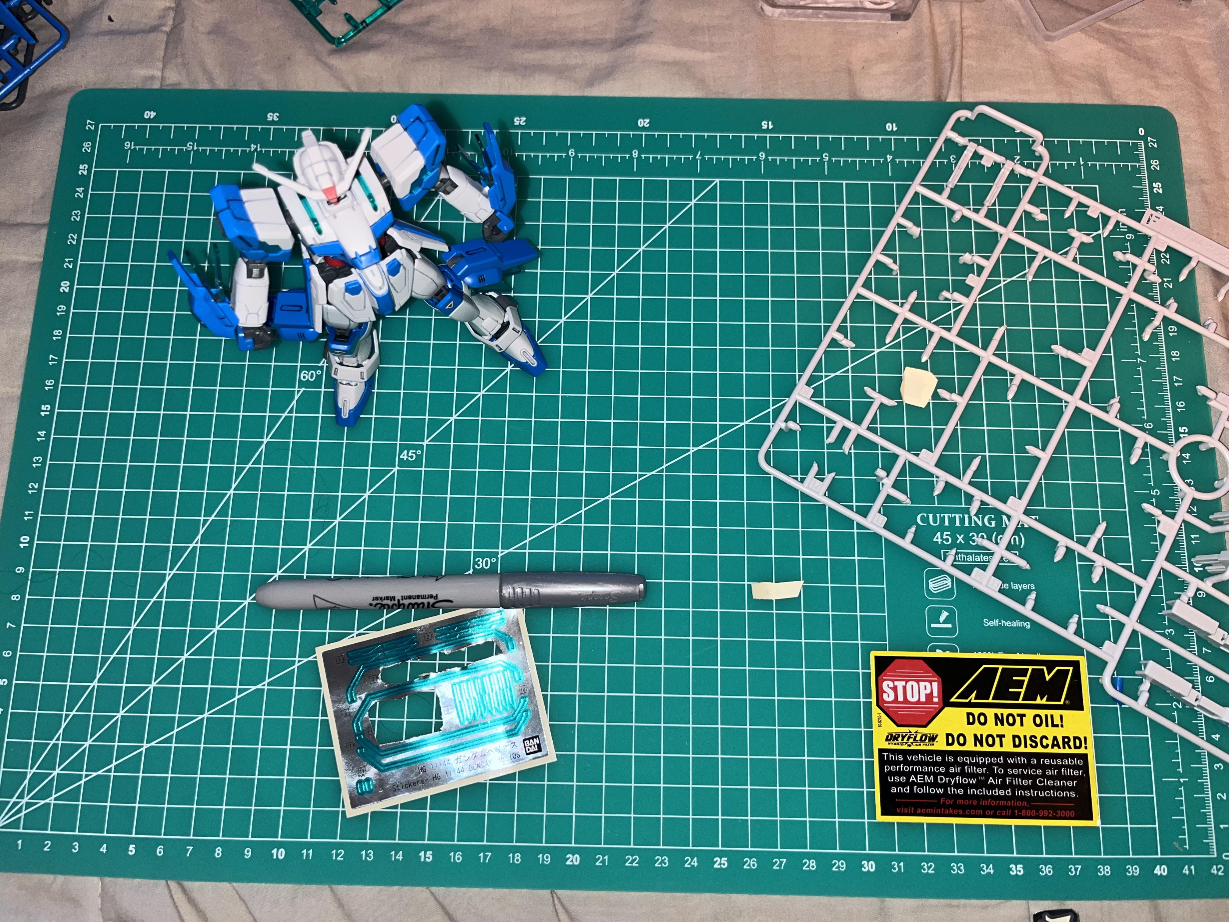 Day 13 of Gunpla finally got a cutting mat and some metallic sharpies