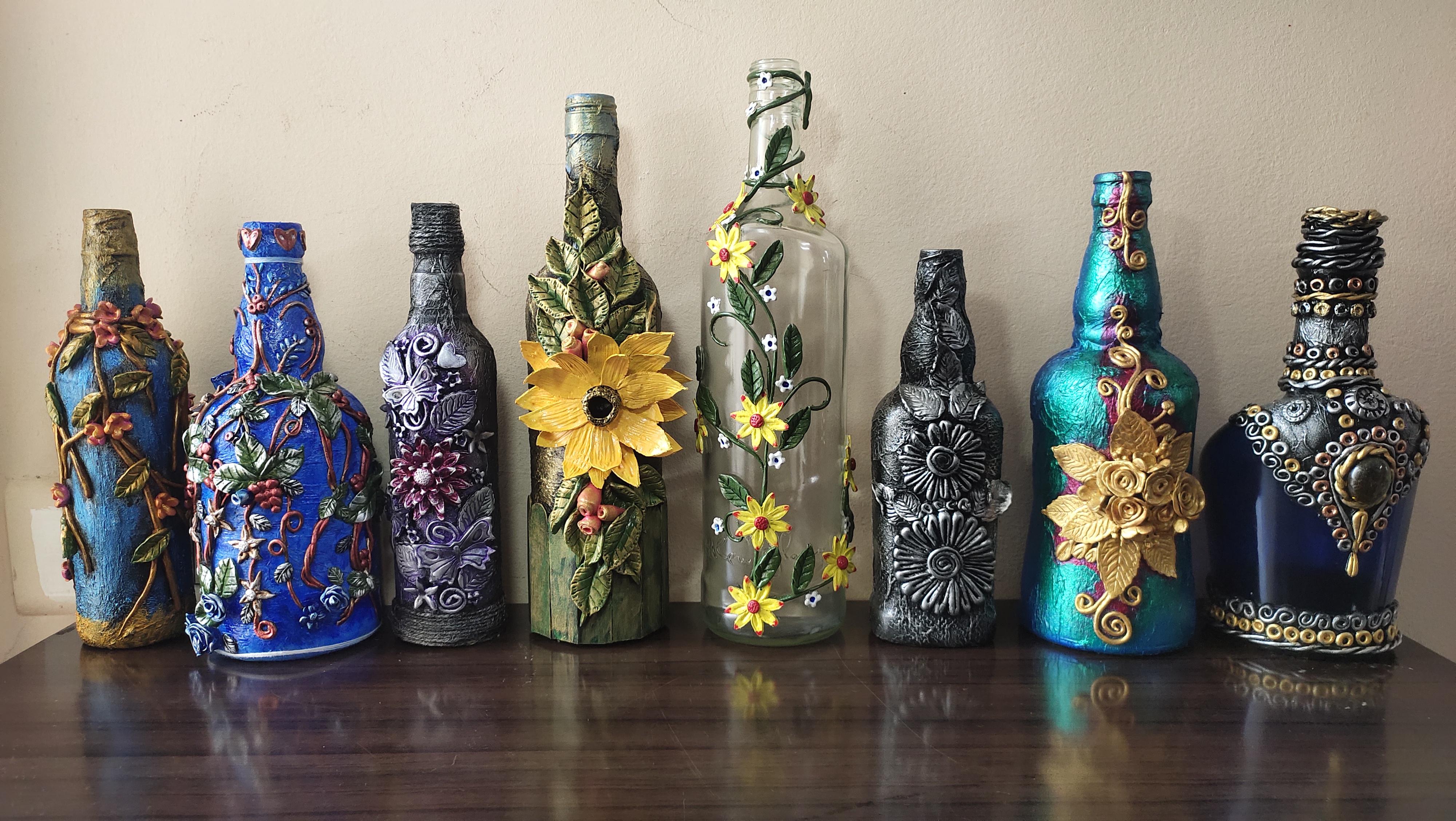 My sister gives a new life to old booze bottles. r/Craftshandmade