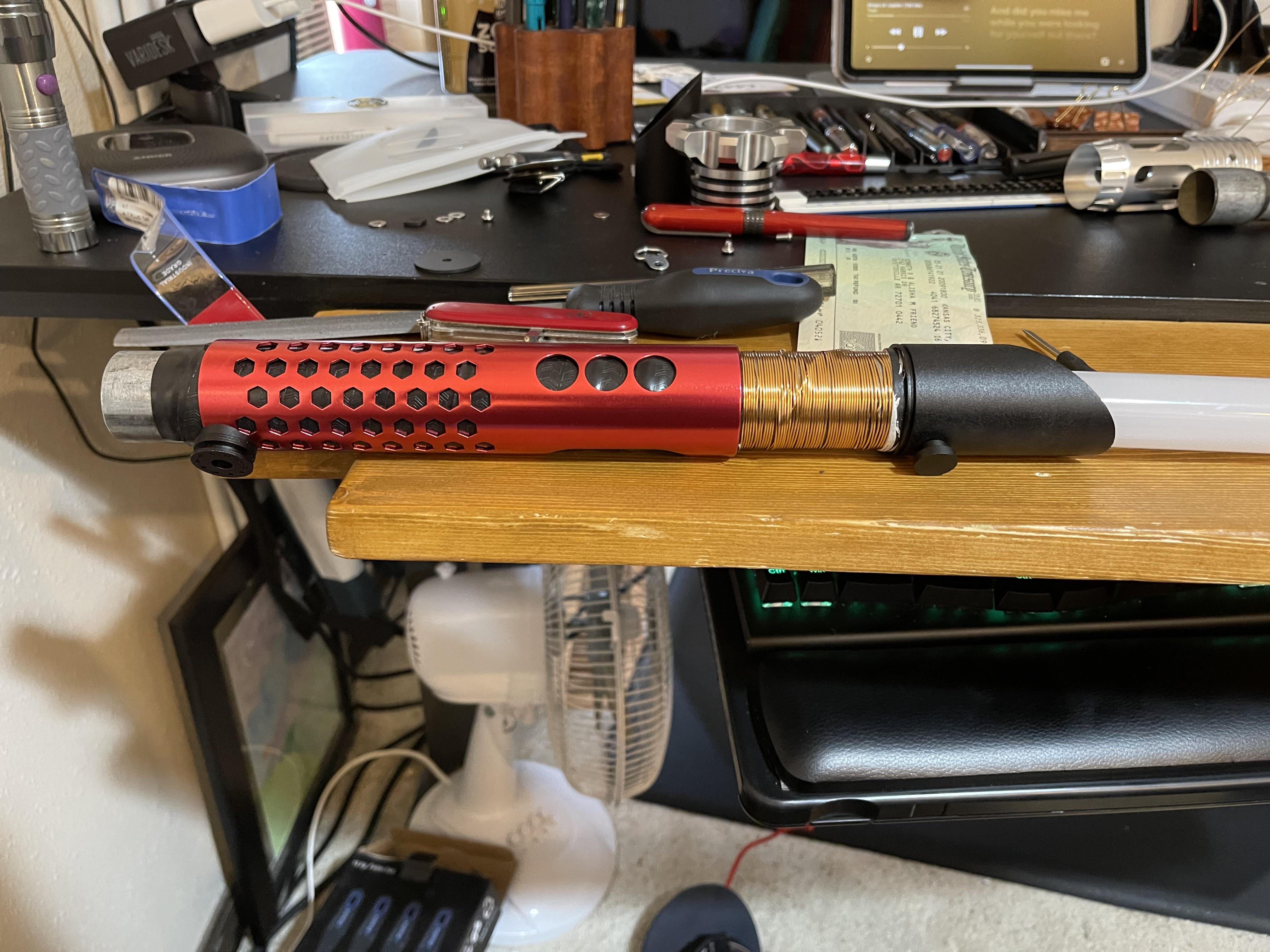First attempt at a lightsaber build. Still needs internals. Made from craft wire, trampoline