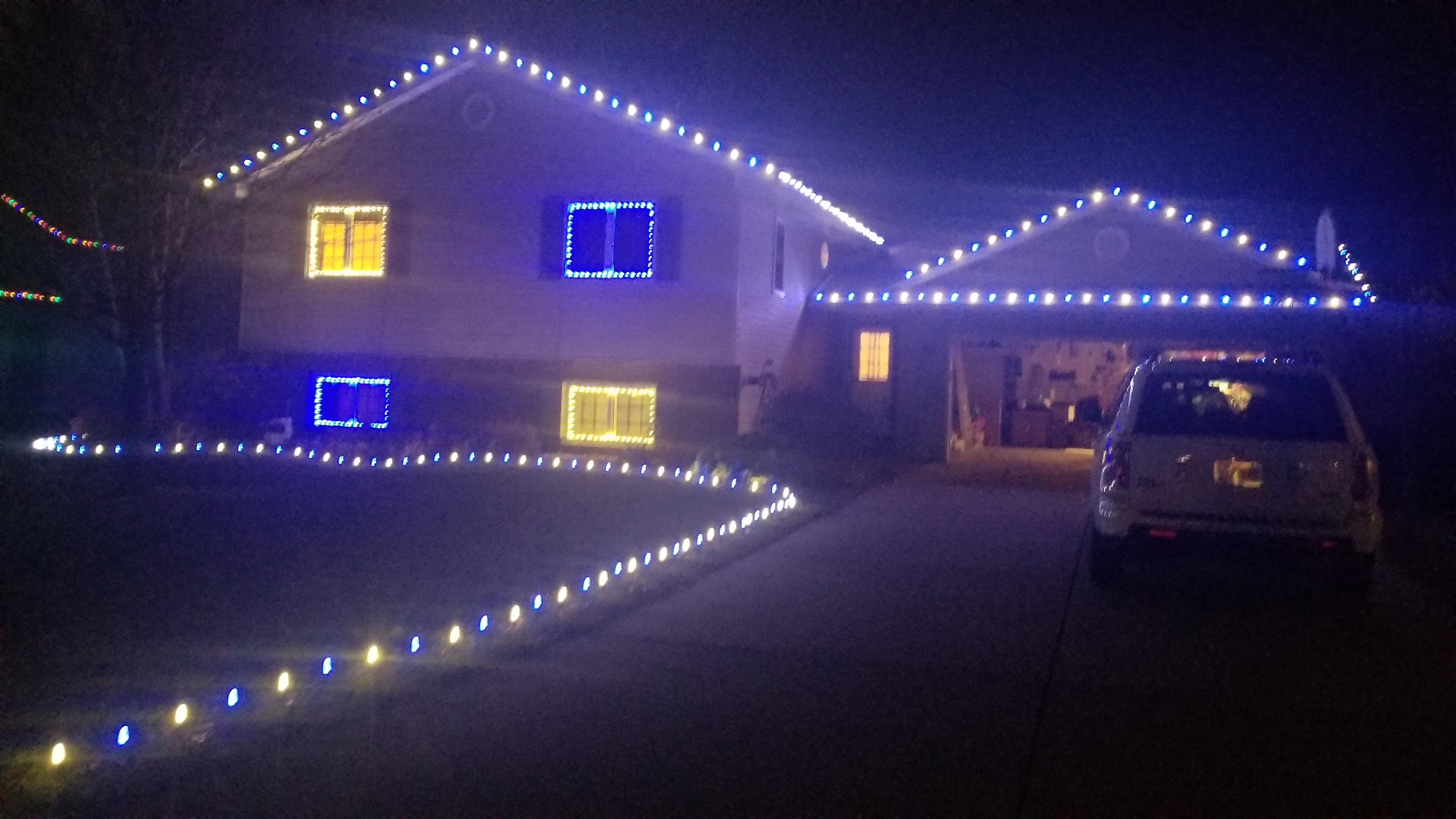 Took a photo of my xmas lights yesterday and didnt notice it until today r/Ghosts