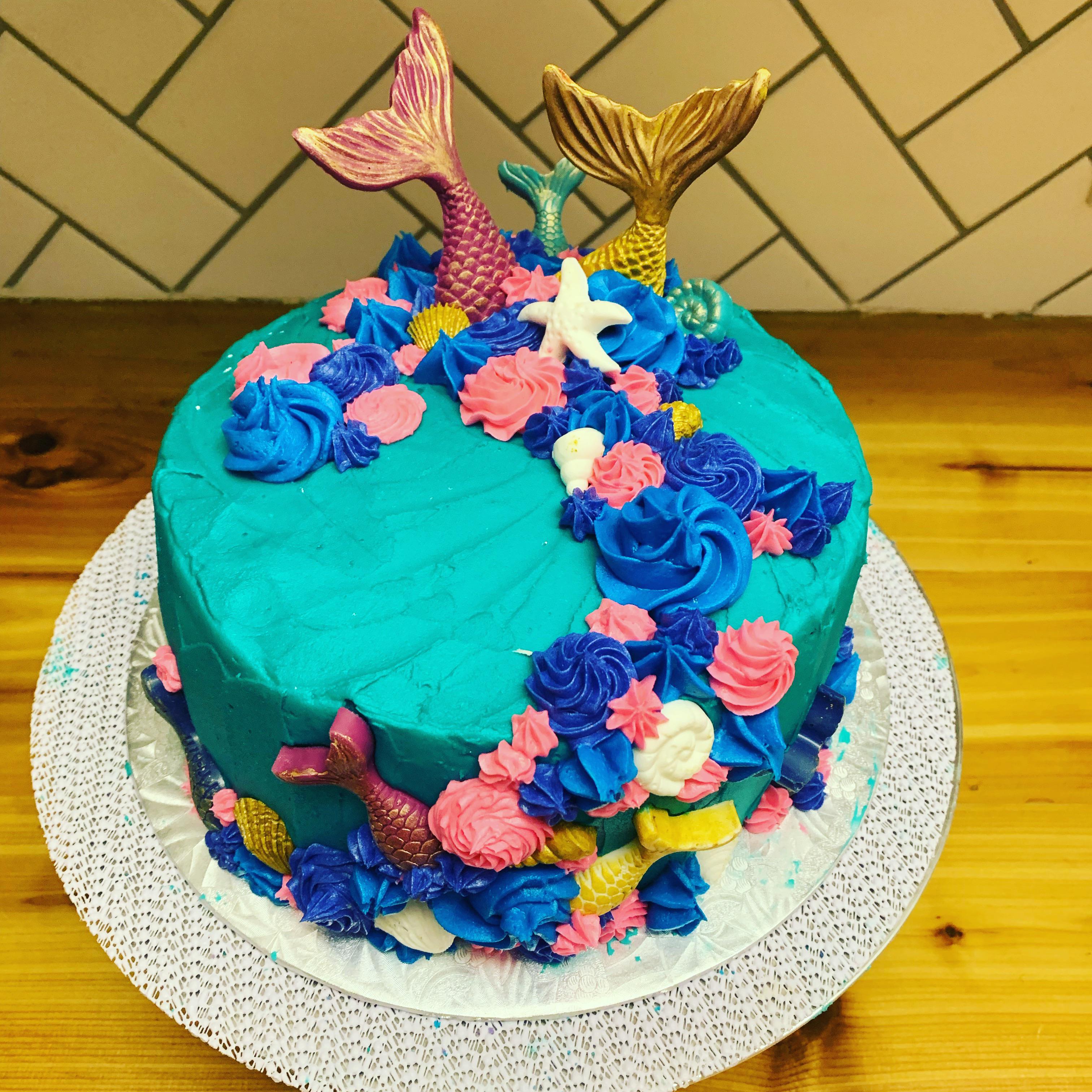 A Mermaid cake for a little girls birthday! Buttercream and white