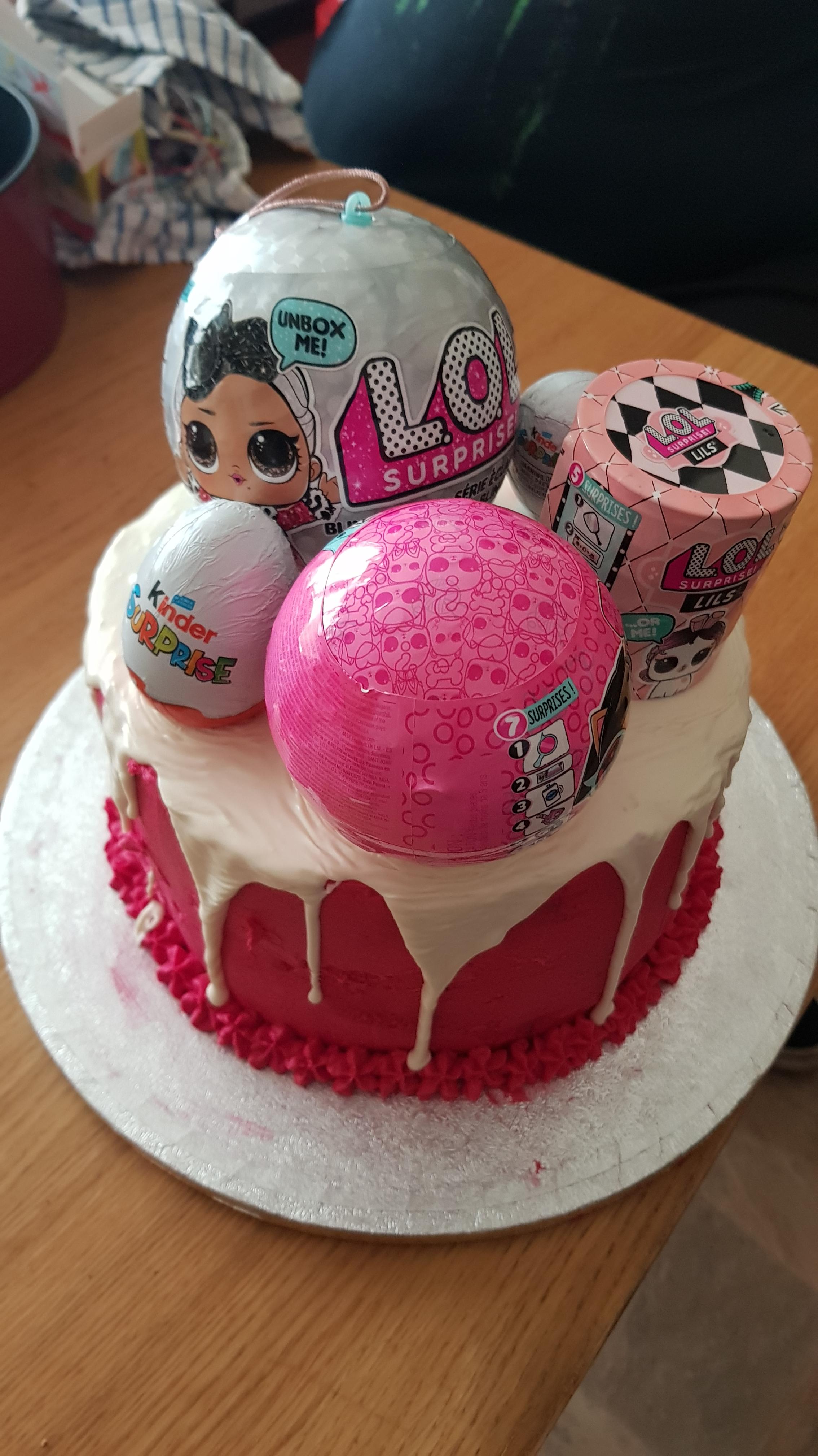 Homemade Pink LOL Kinder Surprise cake with a white chocolate ganache. r/Cakes