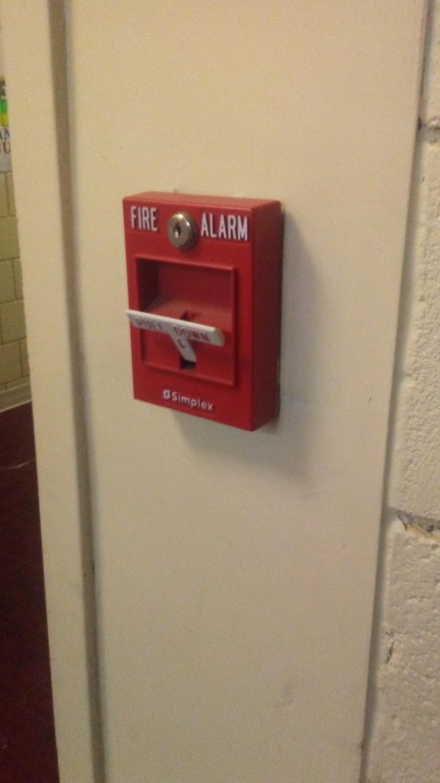 This fire alarm at my job is pulled down just enough that the alarm isn