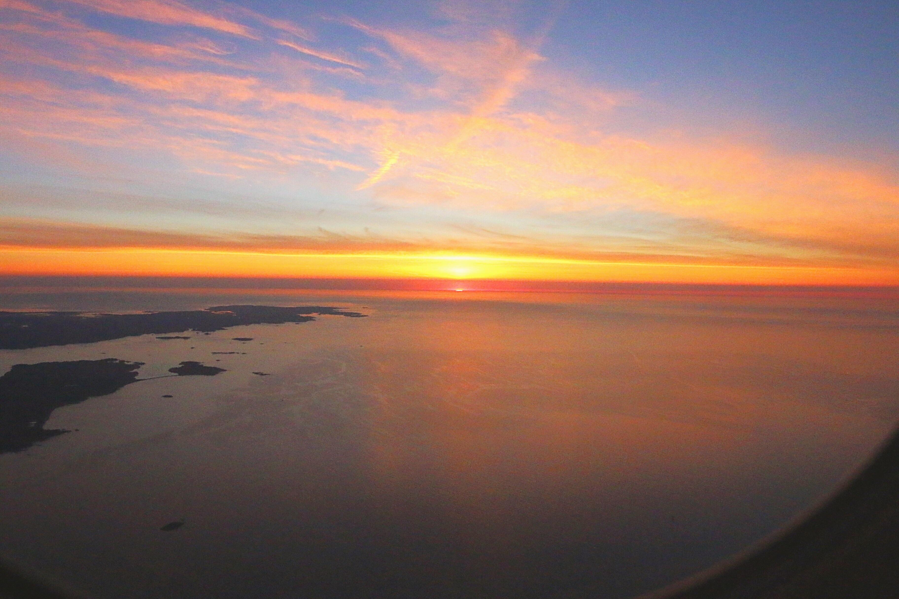 Just caught the sunrise landing in Boston. r/pics