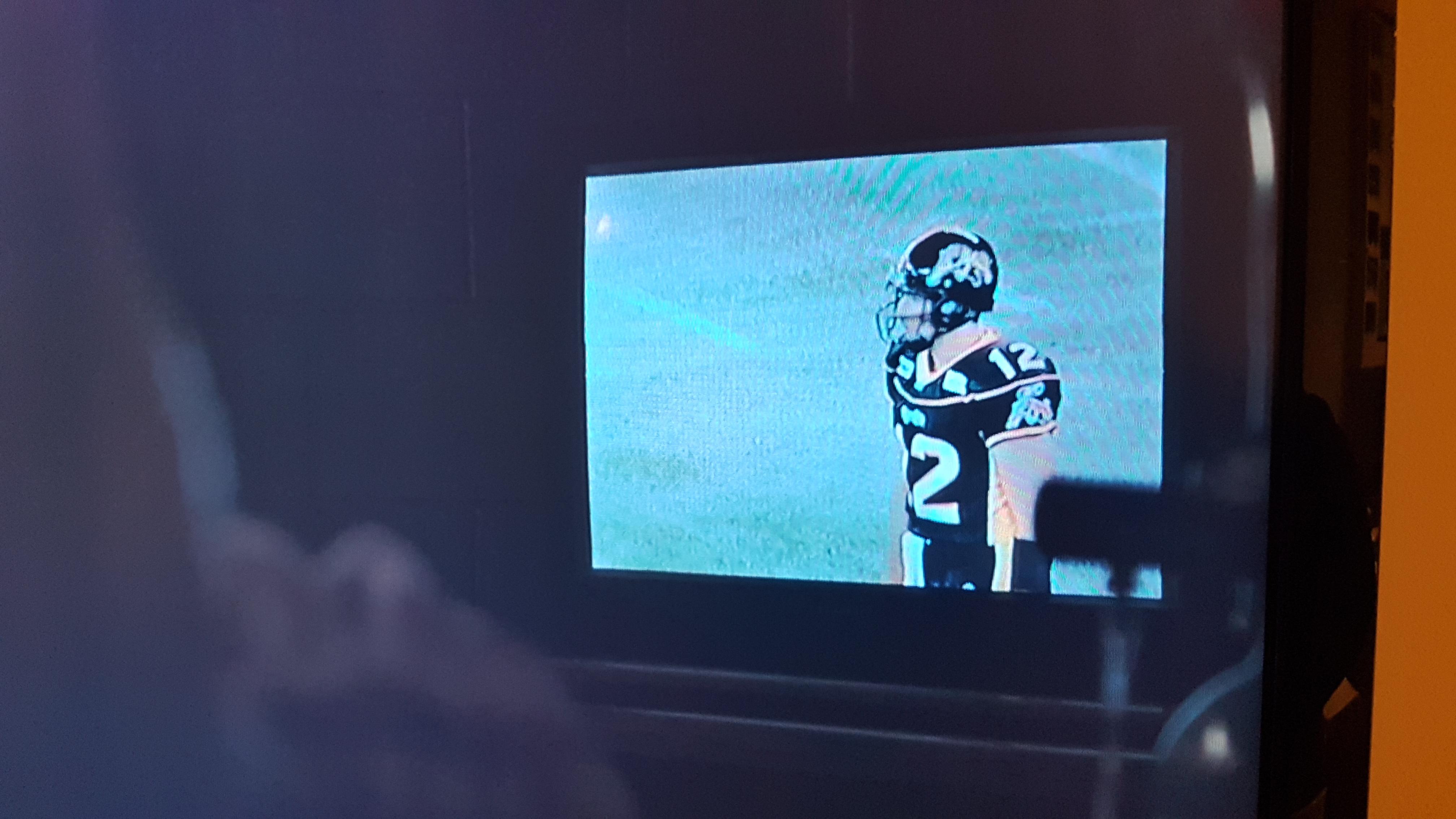 S2E5 4237 in, Buddy is watching the CFL???? Its the Hamilton Tiger