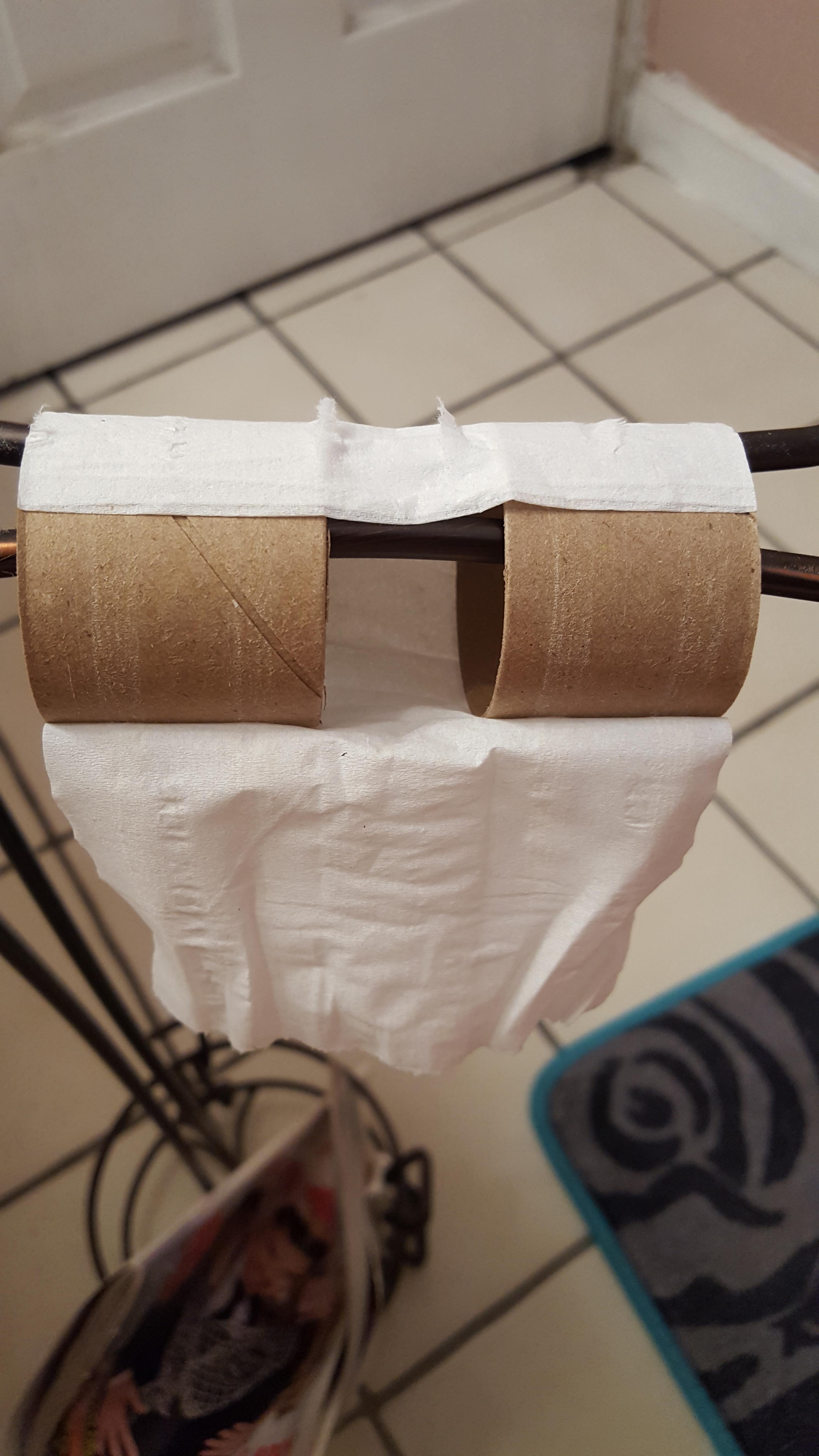 This toilet paper roll has two small cardboard rolls instead of one