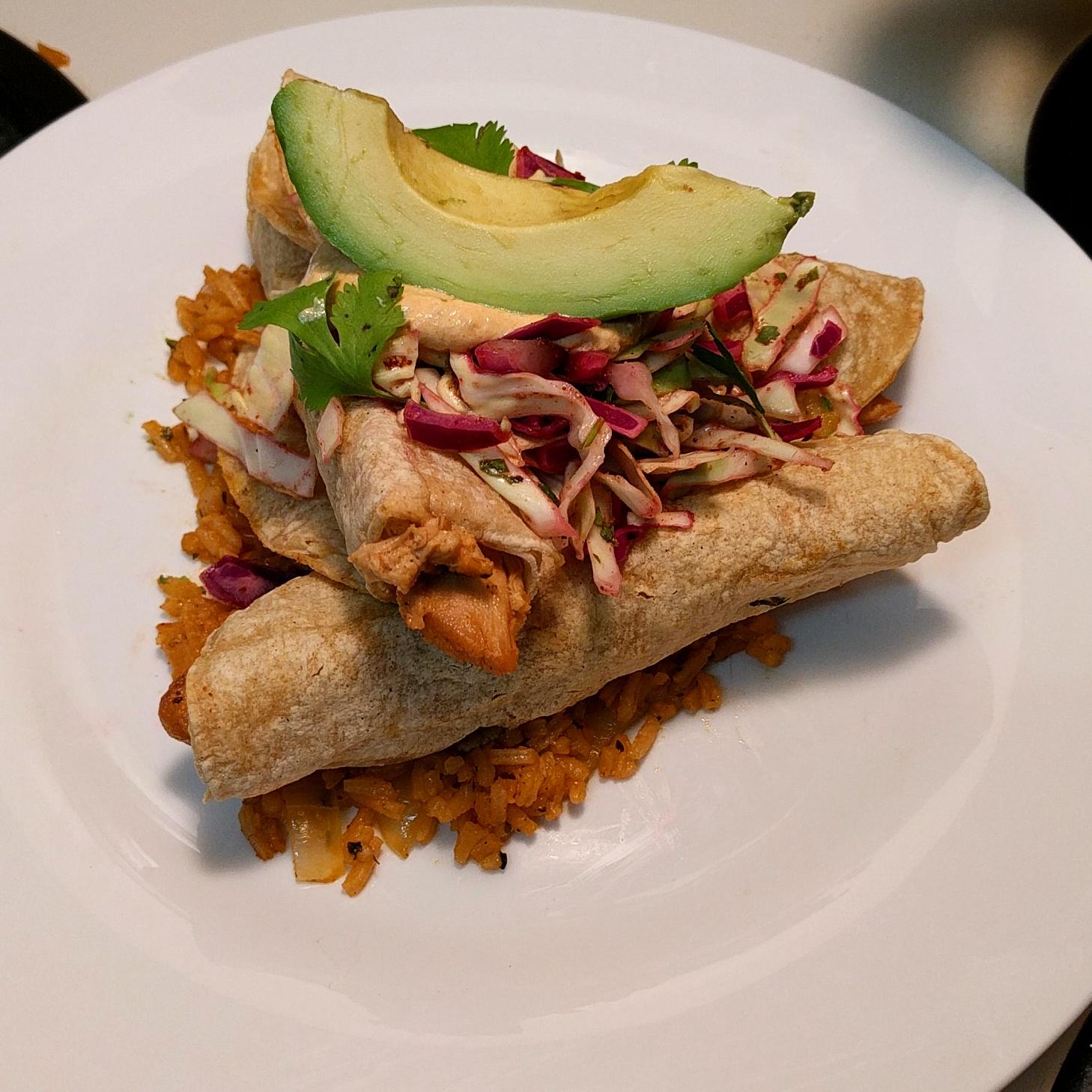 [Homemade] Chicken taquitos, cilantro lime slaw, and Spanish rice r/food