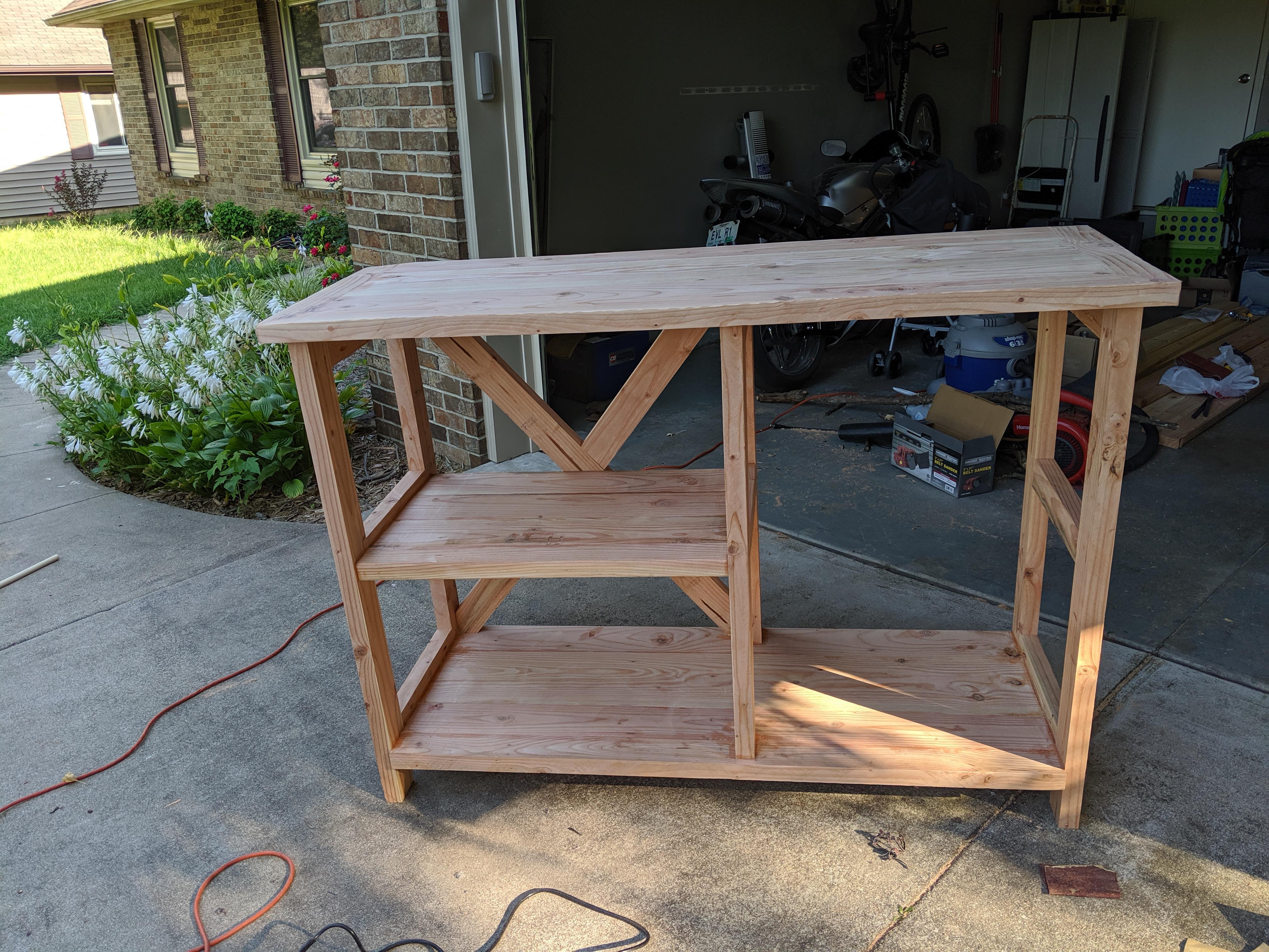 Side bar for a mini fridge and coffee / liquor / beer stuff. Built in