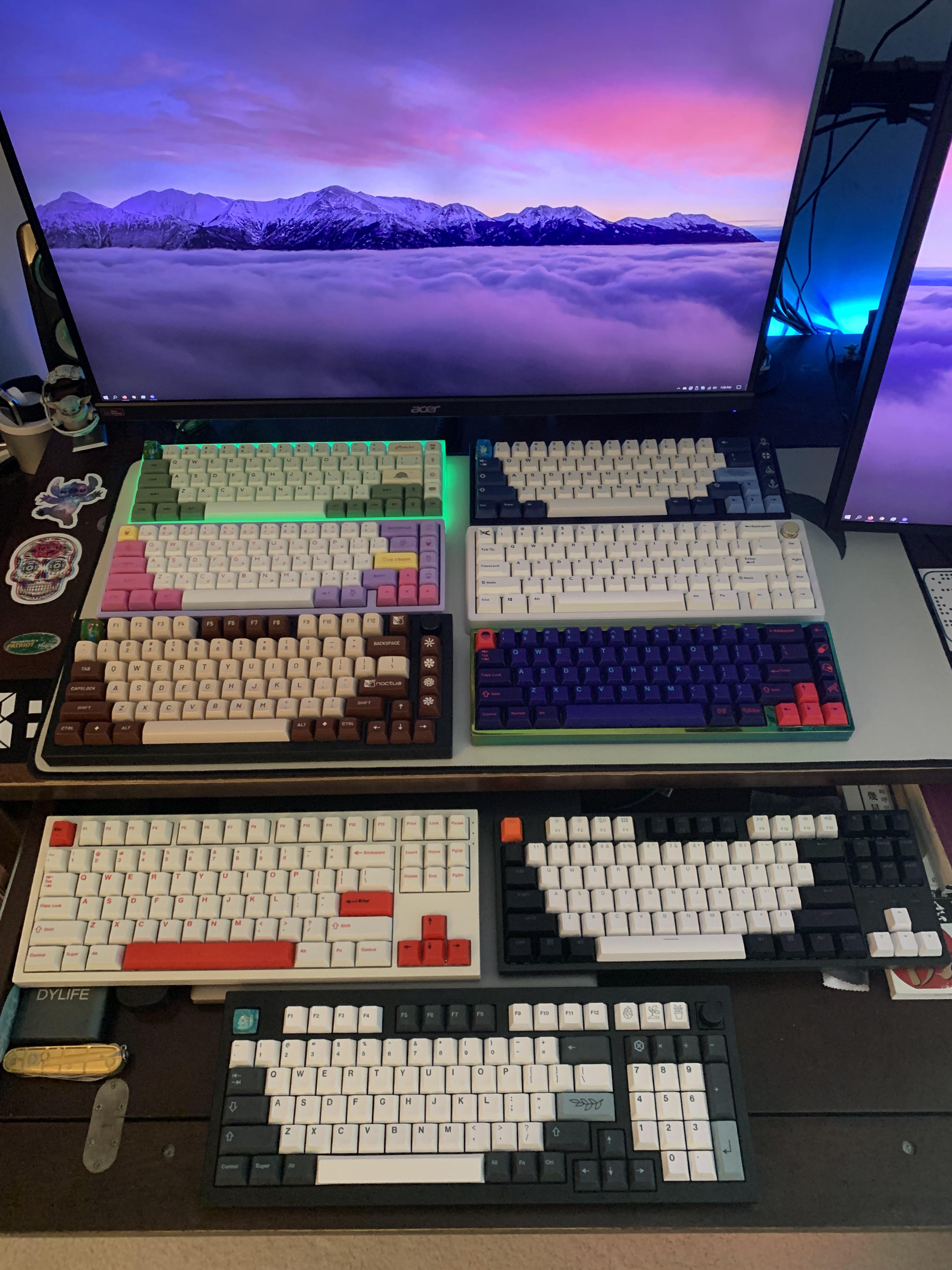 Finally took a picture of all my keyboards! Looking to add a red one to