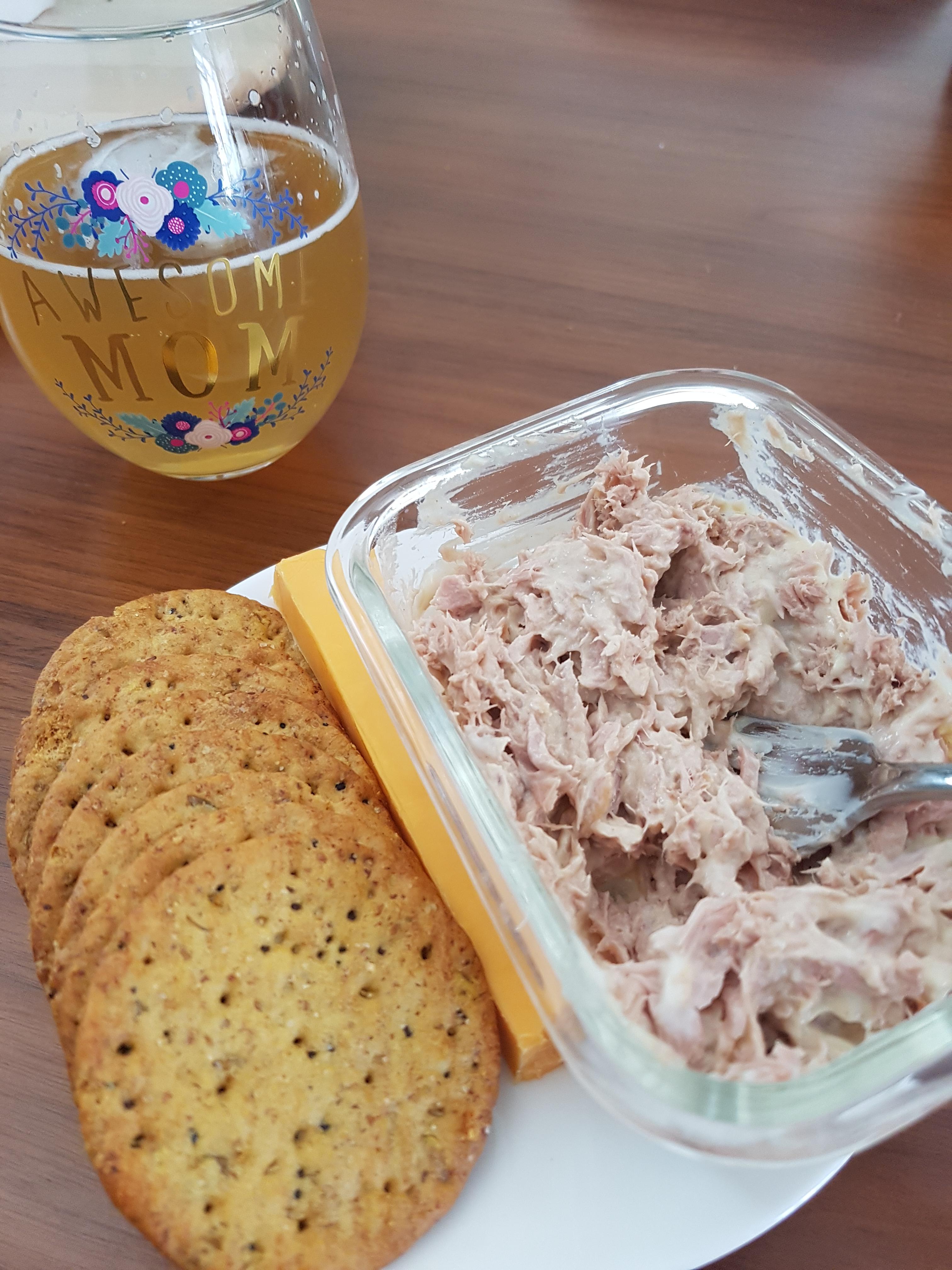 Tuna with mustard and mayo, breaton sweet potato crackers, a block of