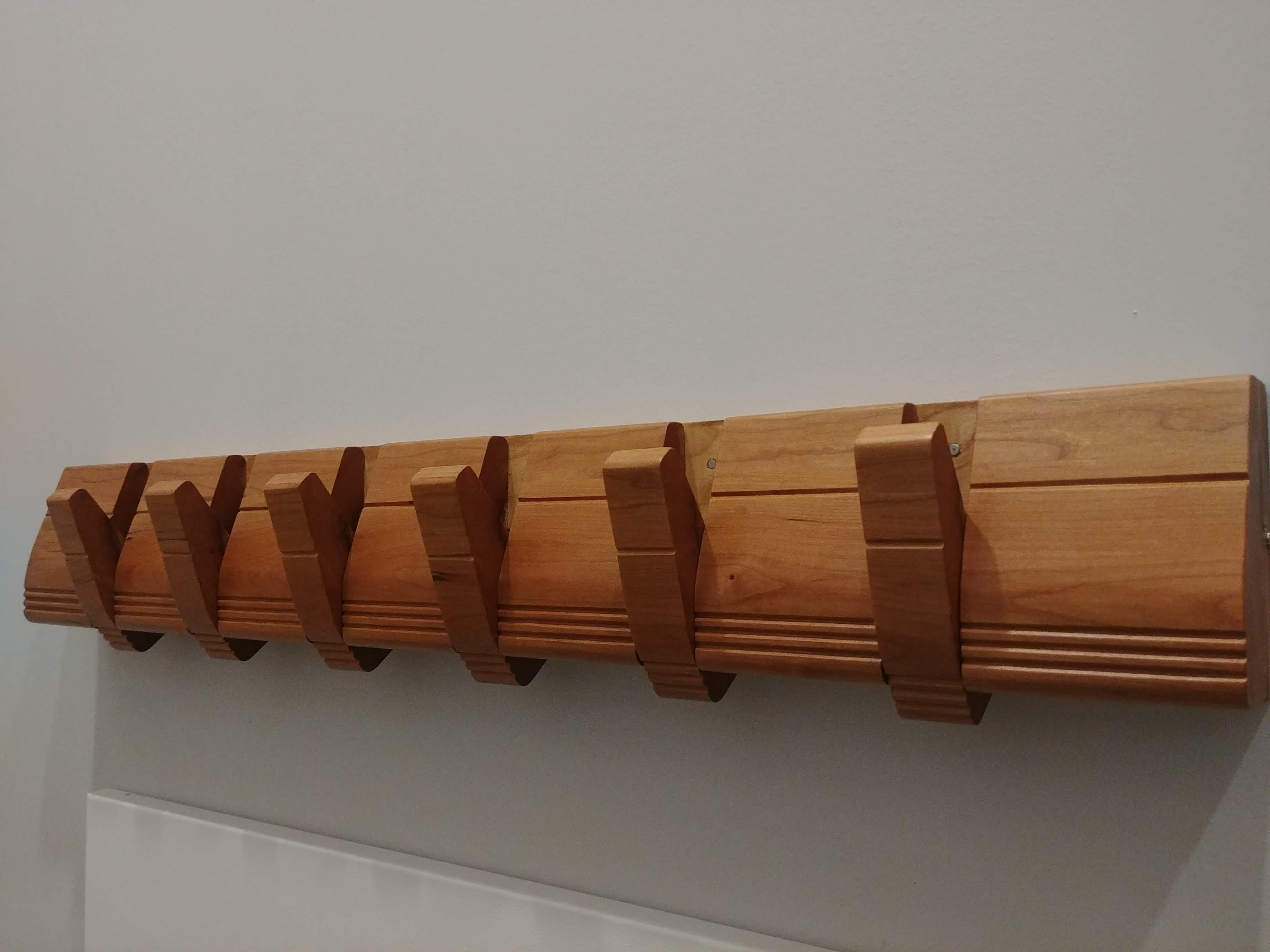 A cherry coat rack with hideaway hooks r/woodworking