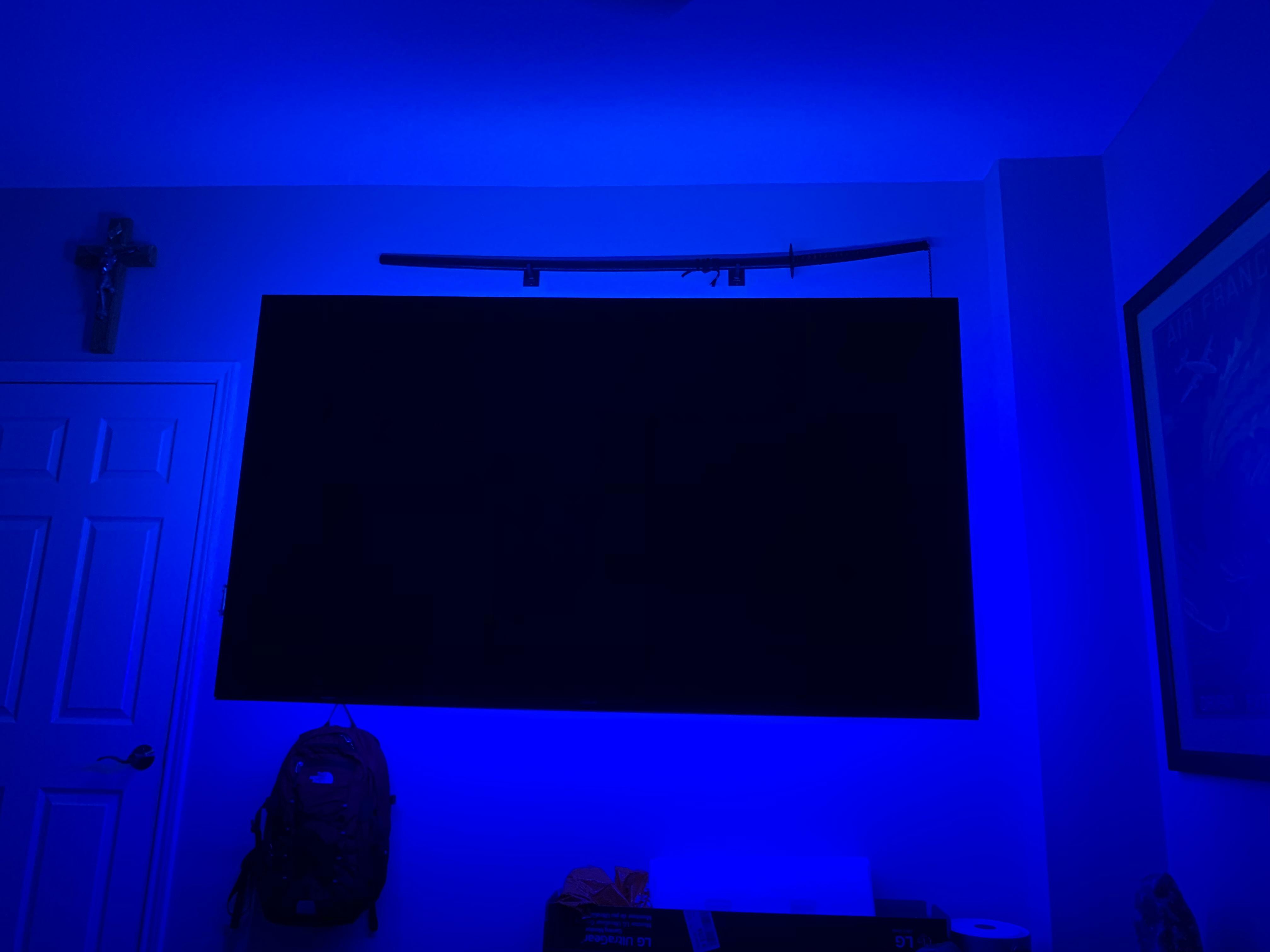 finally got some LED strips behind my TV. r/Hue