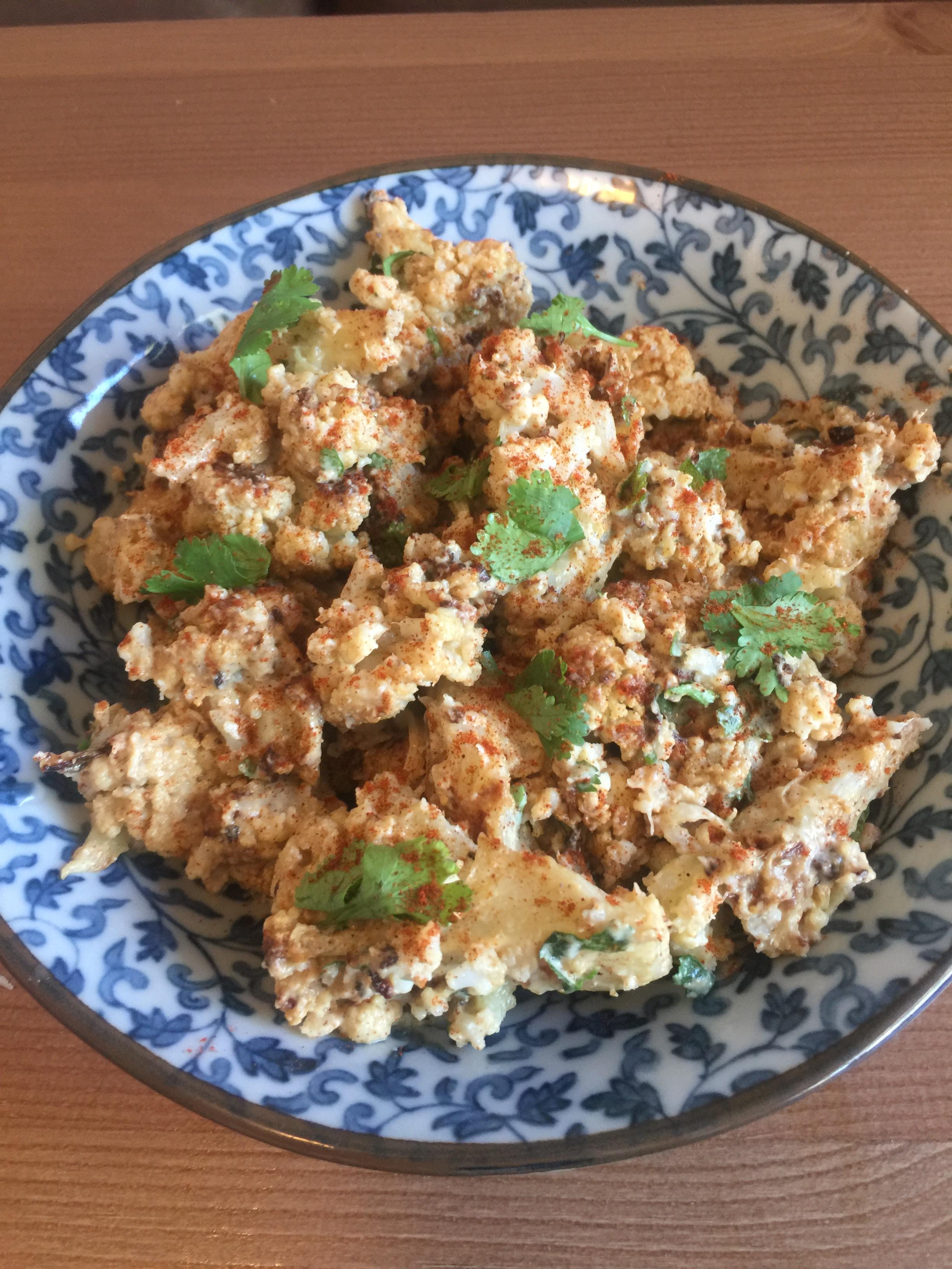 Israeli style cumin and tahini roasted cauliflower vegetarian