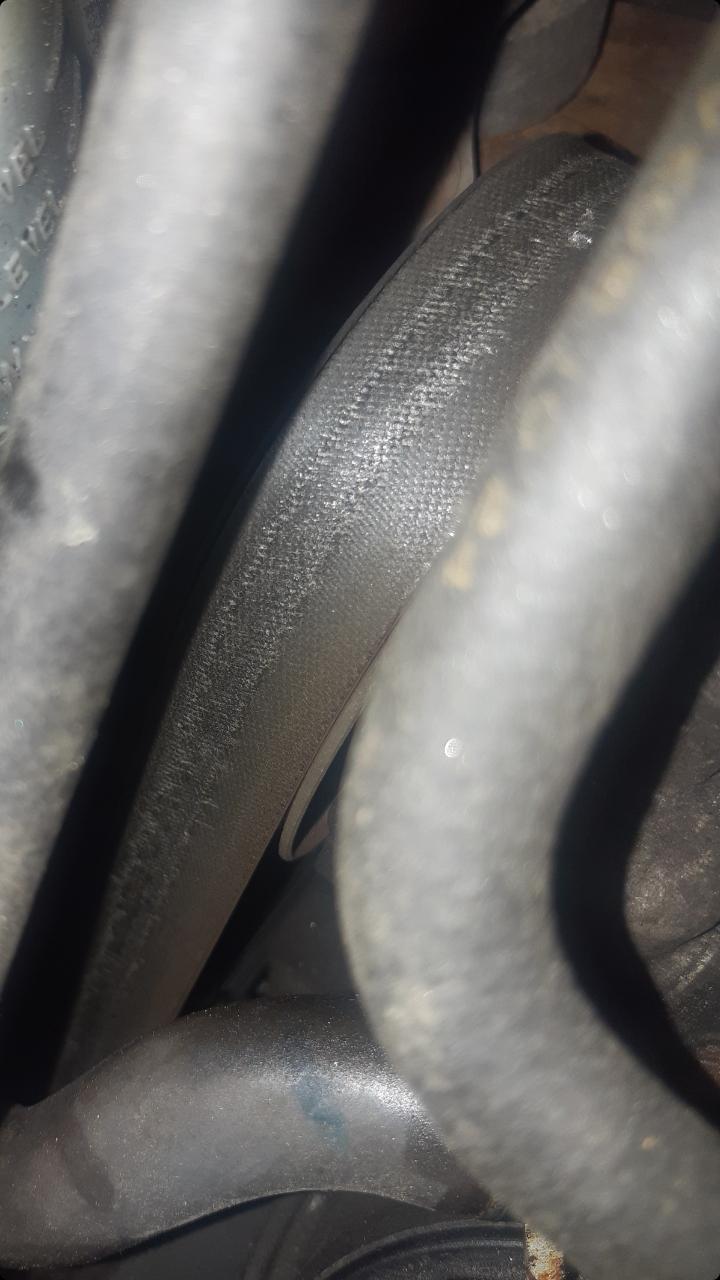Why does my serpentine belt look like this? My car is also making some