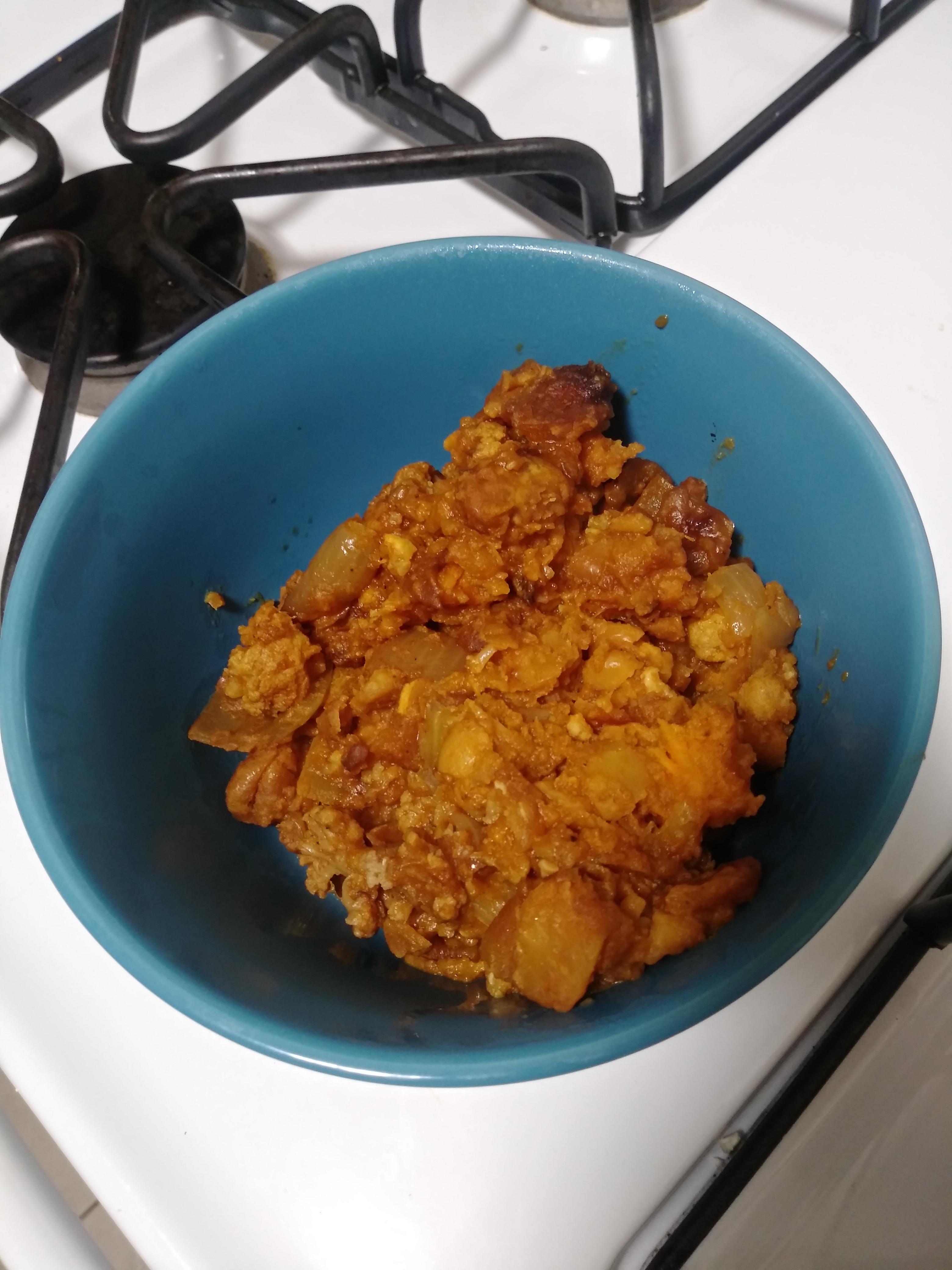 Cauliflower, sweet potato, and garbanzo beans in curry sauce. r