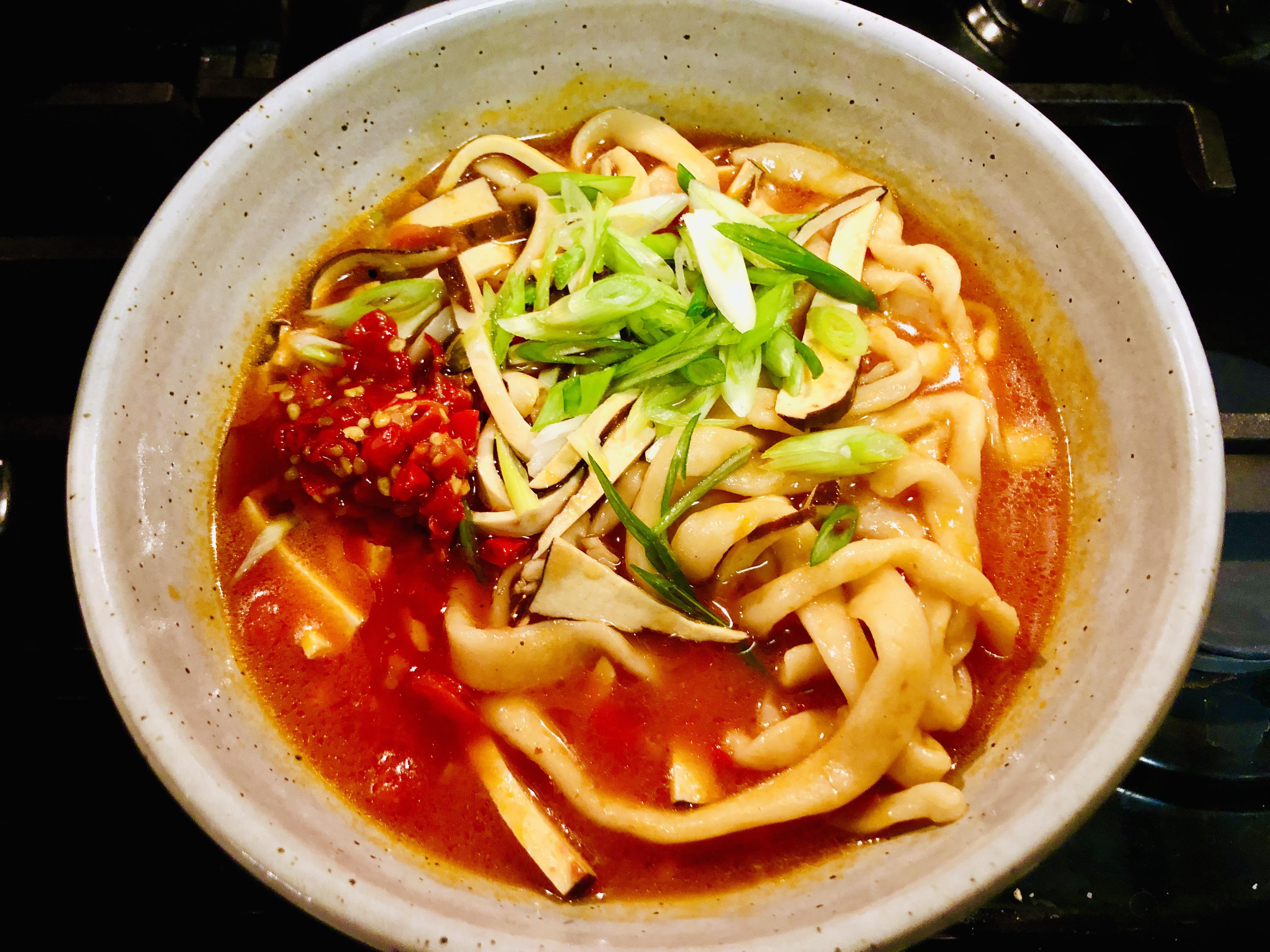 Homemade hand pulled noodles in tomato soup with smoked bean curds 😋 r/chinesefood