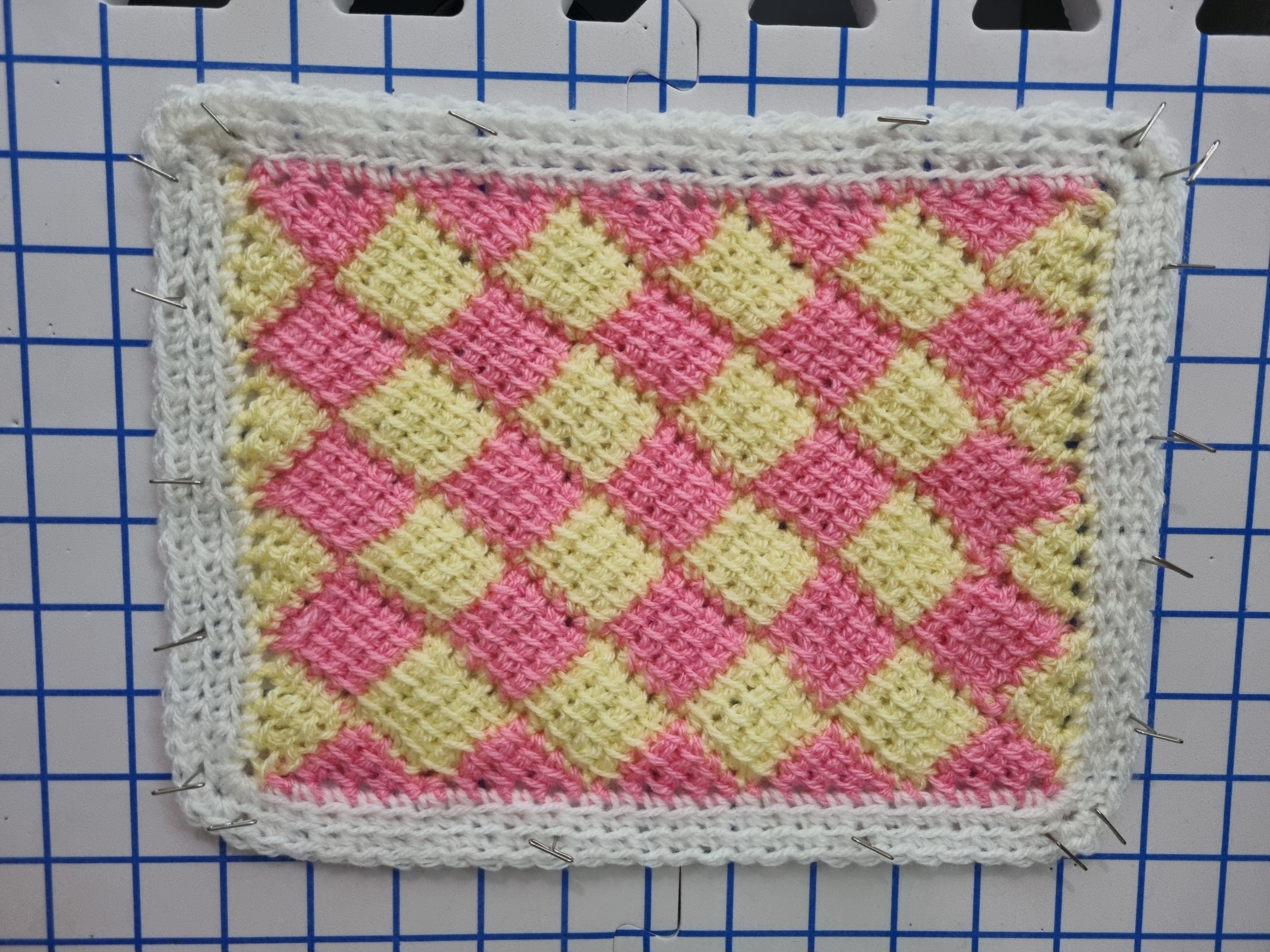 Finished entrelac swatch with border r/Tunisian_Crochet