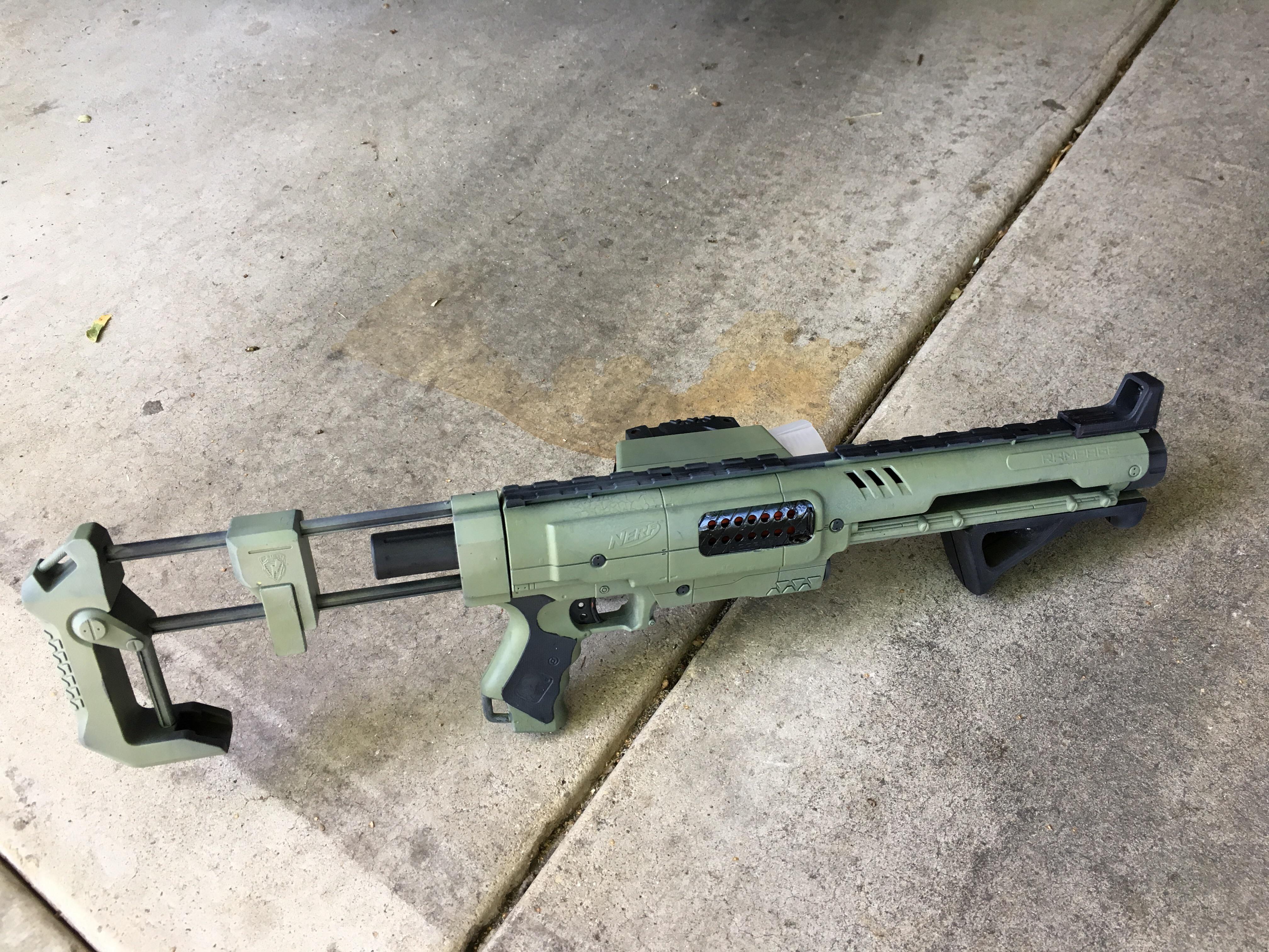 Custom painted nerf rampage OD/Black color scheme. The front grip/pump