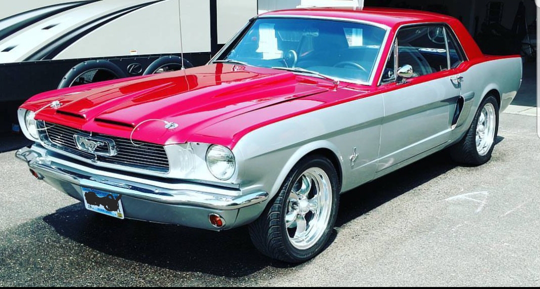 My 1965 restomod Mustang complete with a 351 Windsor, custom fiberglass