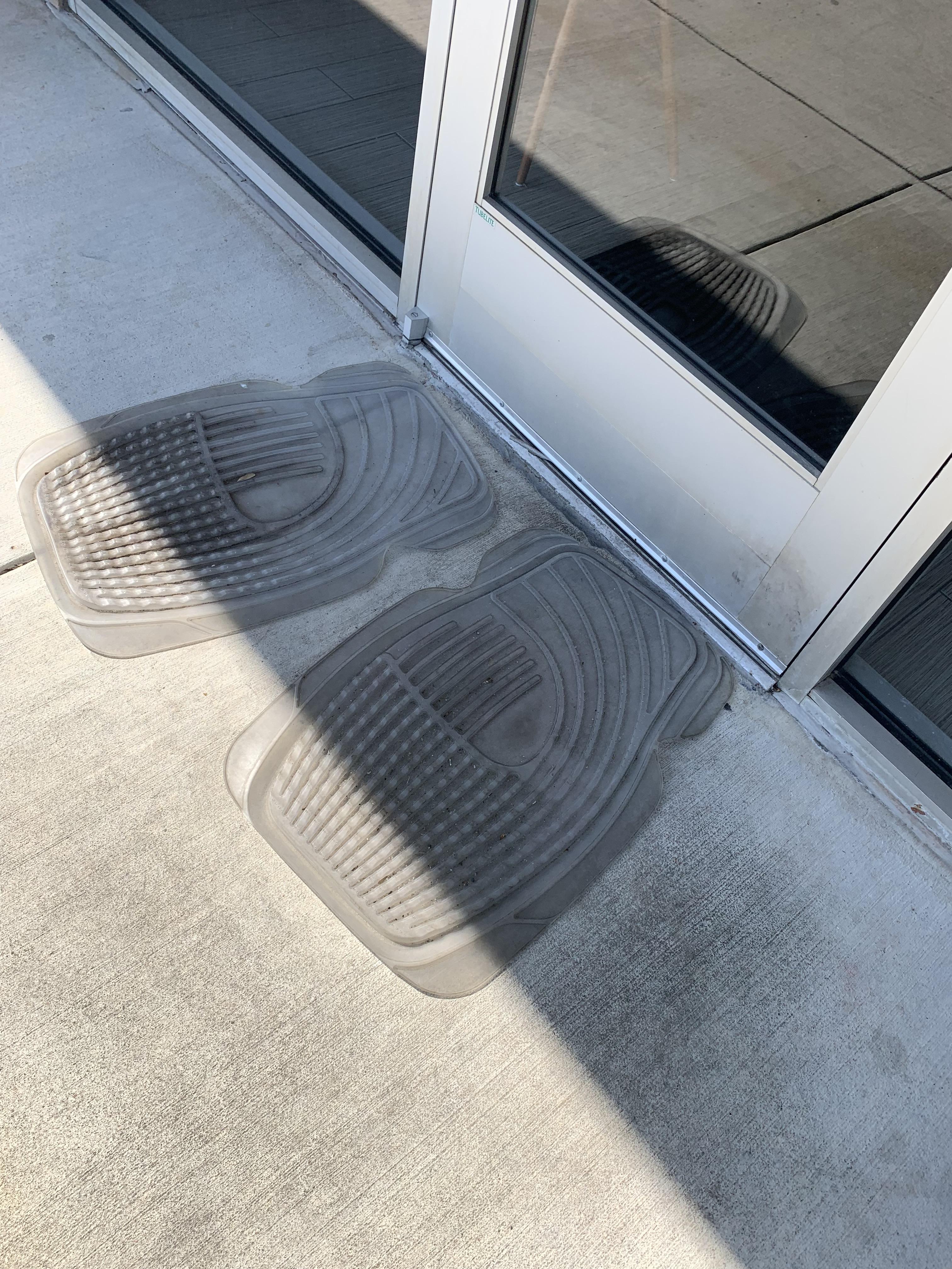 My local Chinese restaurant reuses old car mats for a doormat. r