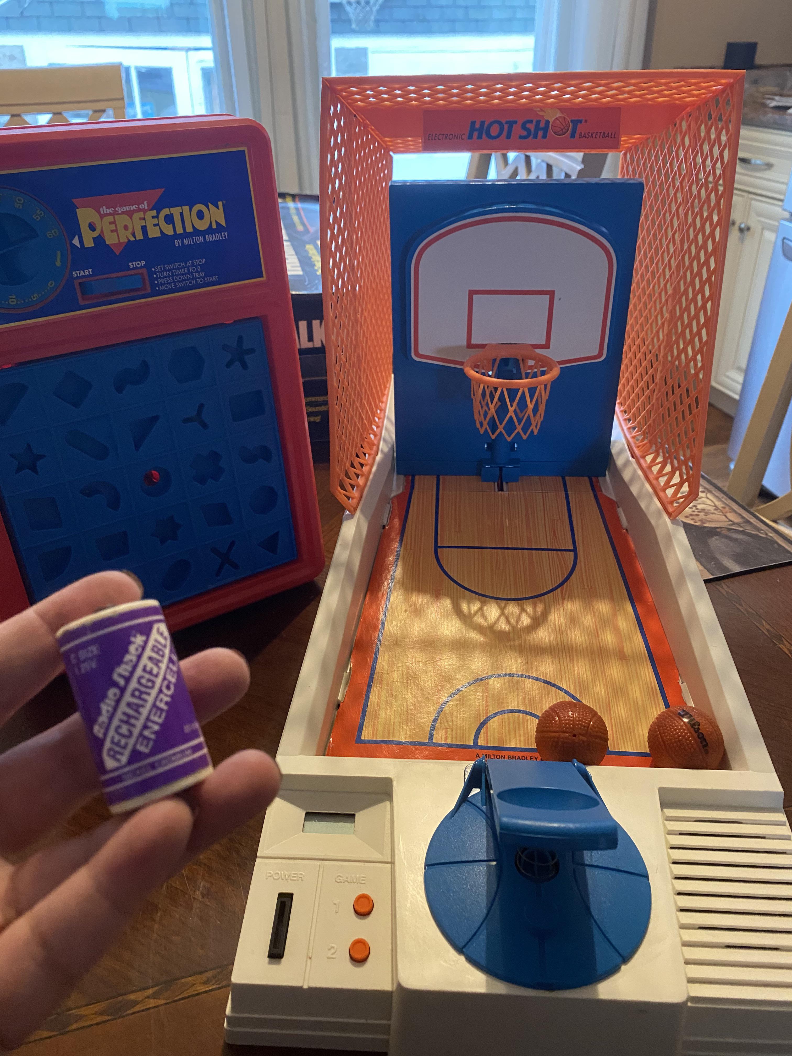 Hot Shots Basketball, Perfection, and a Radio Shack rechargeable enercell. Found while cleaning