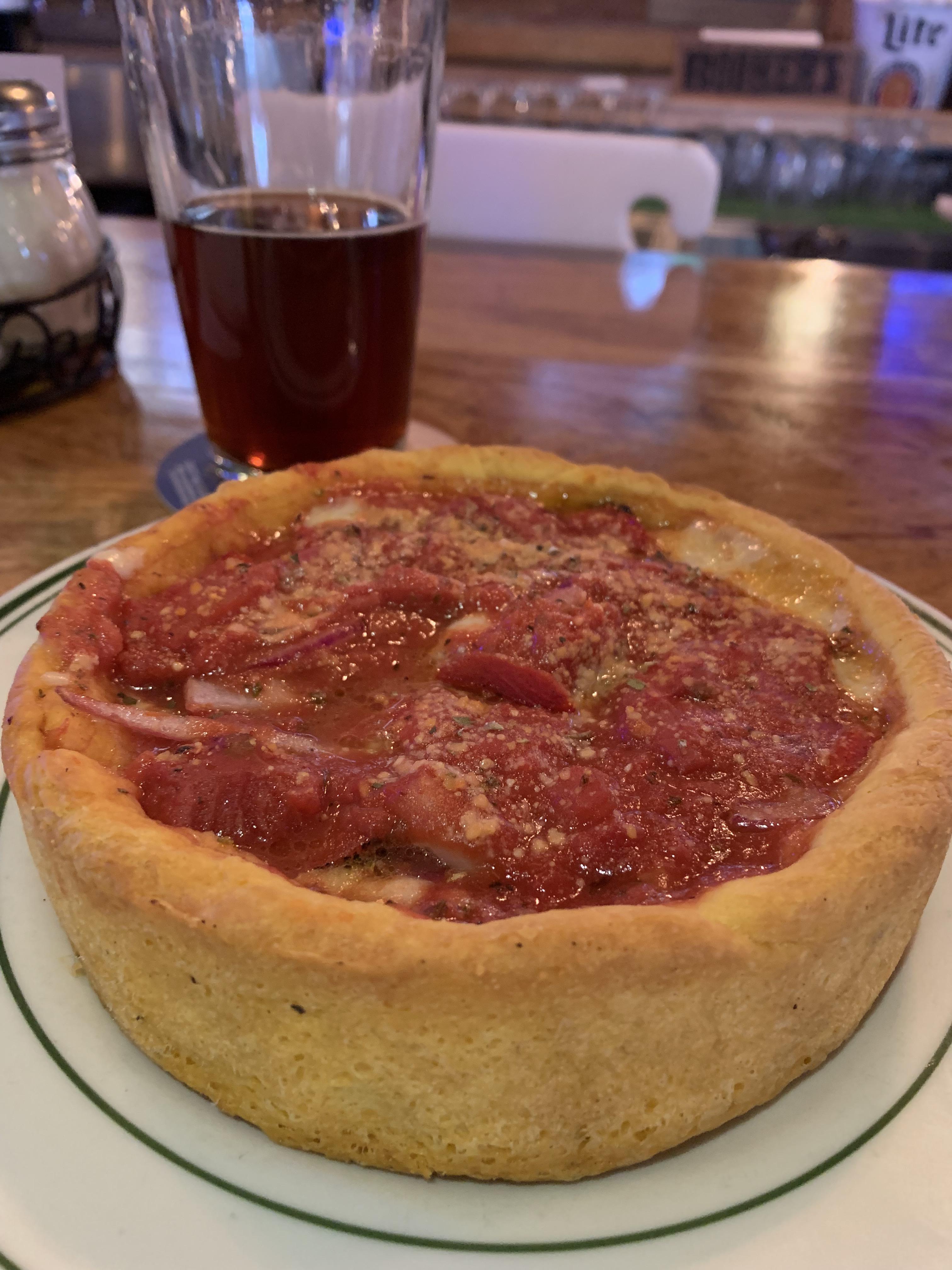 Deep dish from Gino’s in Chicago with a nice, think Porter