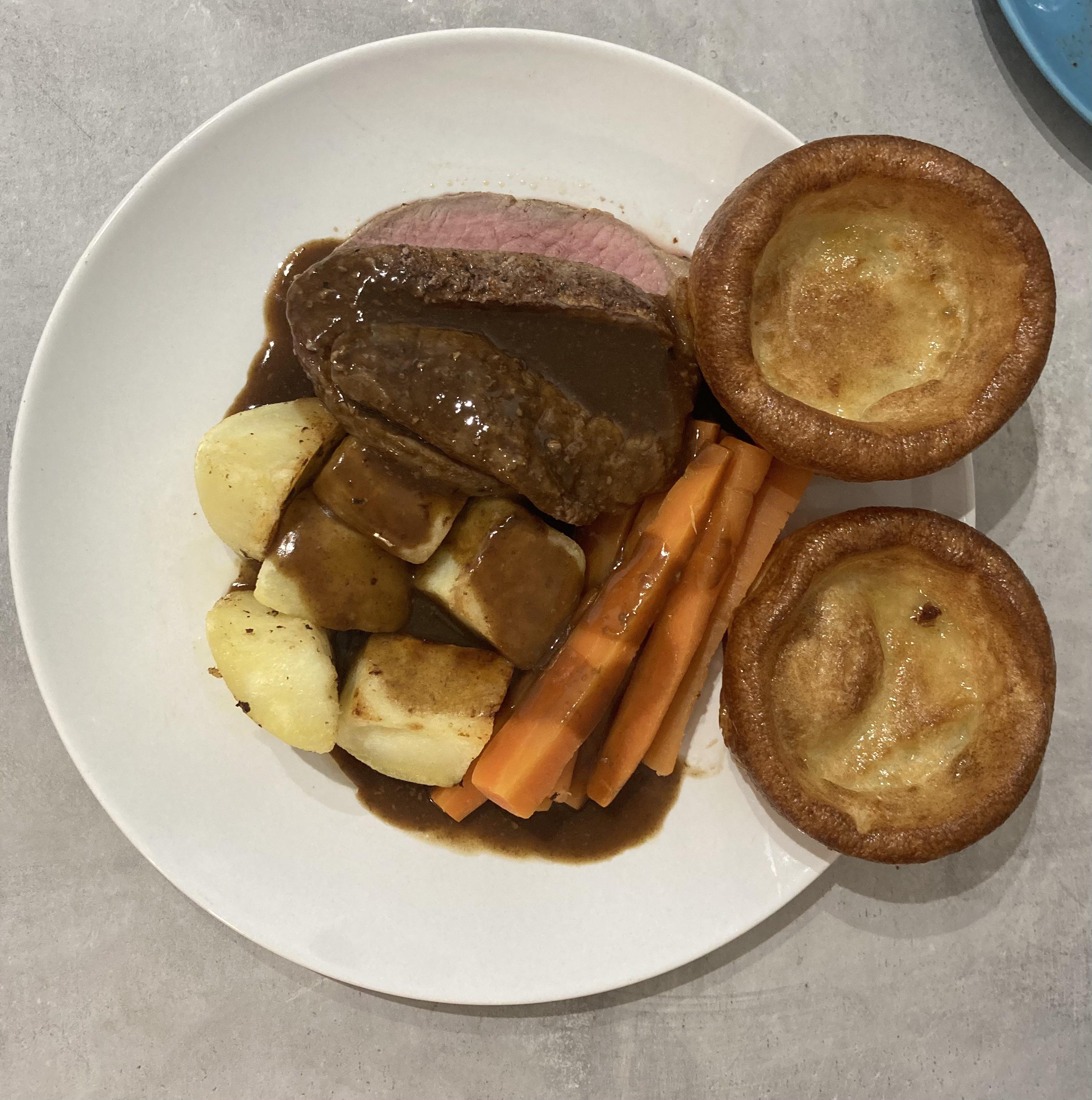 Roast beef, carrots, potatoes and beef dripping gravy. r/UK_Food